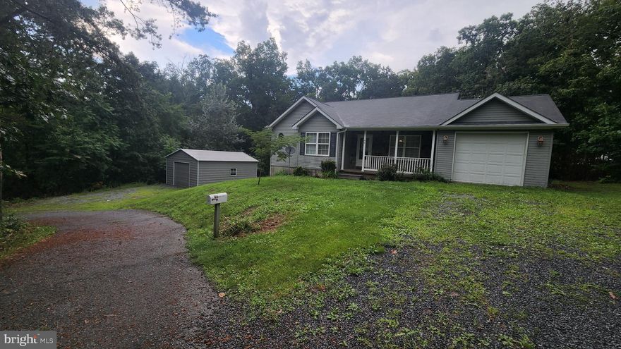 Nestled at the end of a cul de sac. This ranch has a great open floor plan with added privacy of the woods in the rear and side of the property.  Full finished basement with full bath. There is a newer detached garage with a high ceiling. There is an above ground pool in the backyard.  Easy commute to Winchester, Charles Town and I-81. No HOA.
Additional photos coming