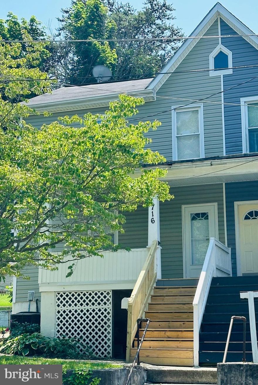 Welcome to this charming duplex in the heart of Brunswick.  This home offers the perfect blend of historic charm and modern amenities.  With 3 bedrooms, 1.5 baths, dining and living rooms there is plenty of space for entertaining or relaxing.  Prepare gourmet meals for friends and family in the updated kitchen.  Next to the kitchen with access to the back yard, the mud/laundry room adds convenience to your daily routine.  Walk-up attic and dry basement provide extra storage.  Step outside to your own private oasis with a rear fenced yard, perfect for summer BBQs, letting your pets run free or enjoying your morning coffee on the deck.  One car garage in the alley for easy off-street access.  Conveniently close to MARC, Potomac River, C&O Canal towpath, local schools, and the city park.  Recent improvements include new front porch and steps, new LVP flooring upstairs, new closet doors in bedrooms, new kitchen appliances and a new roof over the kitchen and laundry rooms.  Don't  miss out on the opportunity to make this house your new home!