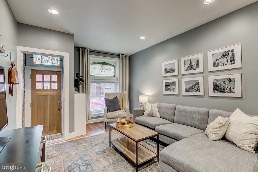 METICULOUSLY MAINTAINED 3 BEDROOM 1.5 BATHROOM HOME ON SOUGHT AFTER BLOCK IN CANTON WITH OFF STREET PARKING PAD. GORGEOUS HARDWOODS CASCADE THROUGHOUT. ENJOY WHITE CABINETRY, IMPORTED TILE, SS APPLIANCES IN OPEN DESIGNER CHEF'S KITCHEN. TONS OF NATURAL LIGHT. FINISHED LOWER LEVEL - GREAT FOR PLAYROOM, OFFICE, HOME GYM, OR SECONDARY GREAT ROOM. RECESSED LIGHTING. HIGH CEILINGS. EXPOSED BRICK. TONS OF STORAGE. WALK-IN CLOSETS. HVAC 2017. REFRIDGERATOR 2018. DISHWASHER 2018. TWO TIER ROOF DECK WITH STUNNING WATER AND CITY VIEWS. CLOSE PROXIMITY TO RETAIL SHOPPING, LOCAL DINING, PATTERSON PARK, AND ALL MAJOR HIGHWAYS. SCHEDULE A PRIVATE TOUR TODAY.