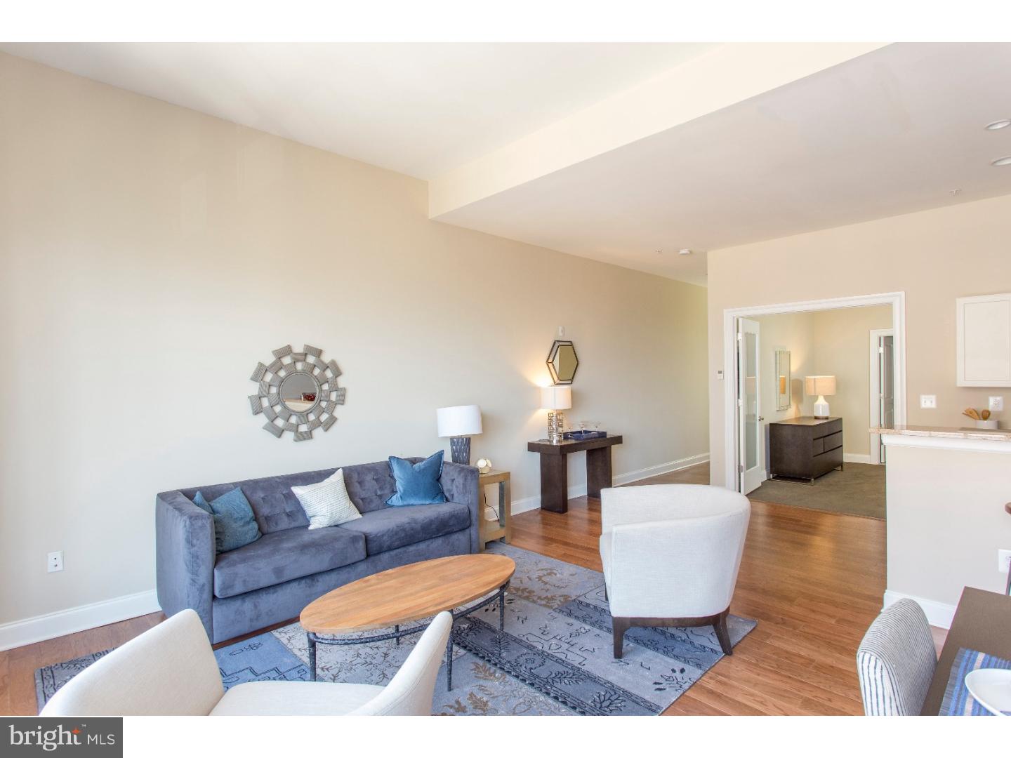 One month free for applications submitted by 9/15!! Luxury one and two bedroom apartments in a Fabulous location! This 1st floor one bedroom features an open floor plan with oak hardwood flooring, an upgraded kitchen with stainless steel GE appliances, granite counter-tops, and beautiful cabinetry, Bosch washer and dryer in each unit, wall to wall windows with custom sun shades, 2 zone energy efficient heating and cooling systems. The building features a front desk attendant and a brand new fitness center! Located just steps away from Marc Vetri's Osteria, South Jazz Bar and Warm Daddy's! Just 2 blocks from the Broad Street subway. SUPER pet friendly!! On site parking is available at 195 dollars per month. **Photos pictured are from the model unit with a similar floor plan.