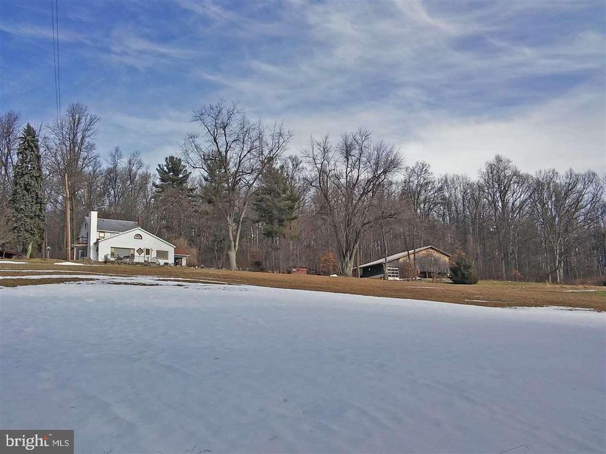Beautiful scenic views on 31+ acres. Enjoy peace and tranquility. This 3 bedroom, 2-story farmhouse is the perfect home for hunting enthusiasts as well as anyone seeking one of the best views in Adams County. Large barn with multiple levels and electric/water service.