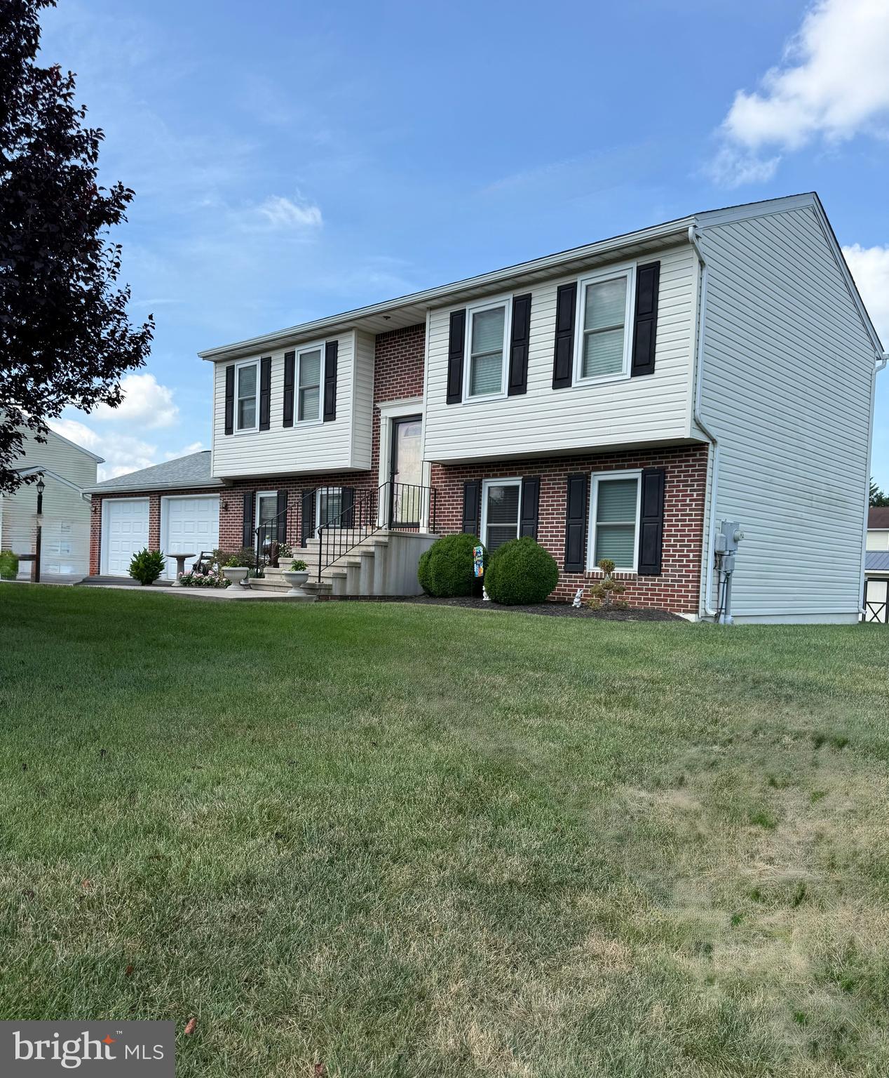 ***This home loan is assumable at a very attractive 2.875% for VA Veterans!***
Welcome to this immaculately split level home. This property has 3 bedrooms, 2 full baths and has many upgrades. Kitchen offers all stainless steel appliances and double sink. The Livingroom is a cozy gathering place for family and friends. The upstairs bathroom has a new shower/tub. The spacious primary bedroom is located on the lower level and has 2 separate closets and a private bathroom. The garage can easily accommodate 2 cars and has plenty of storage. New roof was installed in 2021 and new windows throughout were installed in 2021. The trex deck is a great area for outdoor dining and entertaining! Below the deck is a patio great for relaxing. Located in the Nottingham Meadows development, the HOA cost is only $50.00 per year. Located close to PA/MD line with easy access to I81 - perfect for commuters.