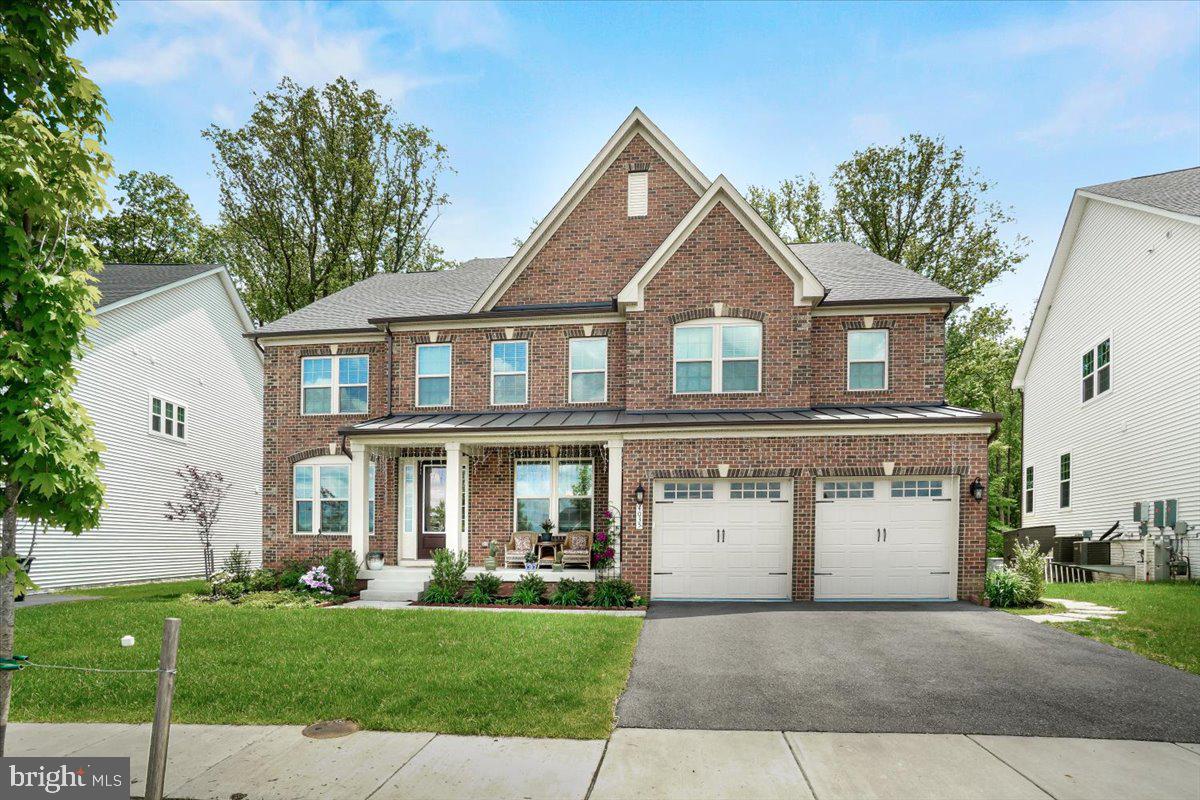 Discover this stunning 6-bedroom, 7-bathroom brick-front home in the highly sought-after Westmount neighborhood. Just 3 years young, this modern residence offers both style and space in a prime location.
Step inside to a grand two-story foyer and high-end rigid-core wood flooring that flows into a formal dining room, perfect for entertaining. The gourmet kitchen features an oversized island, quartz countertops, stainless steel appliances, and a sunlit breakfast area with views of the backyard.
The spacious family room boasts soaring two-story ceilings, abundant natural light, and a cozy fireplace. A main-level bedroom with a full bath offers flexibility as a home office or in-law suite.
Upstairs, you’ll find four generously sized bedrooms, each with its own private full bathroom. The luxurious primary suite includes a tray ceiling, spa-like ensuite with dual vanities, and a massive walk-in closet.
The fully finished walk-out basement adds even more living space, featuring the sixth bedroom with a large window, a full bath, a spacious recreation area, a wet bar, and direct access to the backyard. Enjoy the outdoors with a beautiful deck off the main level, perfect for grilling or relaxing, and a patio that opens to a private, tree-lined yard—ideal for entertaining or quiet evenings.
Additional features include two laundry areas, each with its own washer and dryer—one on the upper level and one in the basement—for added convenience. The attached two-car garage is equipped with an EV charging outlet, perfect for electric vehicle owners.
Don’t miss this rare opportunity to own a beautifully maintained home that combines luxury, functionality, and an unbeatable location. Schedule your private showing today or explore more through the virtual tour!