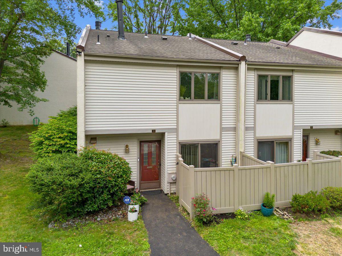 Welcome home to this beautifully updated end-unit 3-bedroom, 2.5-bath townhome nestled in the highly sought-after Twin Brooks community of Abington Township. From the moment you arrive, this residence offers the perfect blend of elegance, comfort, and low-maintenance living—ideal for those seeking a home to love for years to come. Step inside to a spacious foyer with a hall closet and a stylish powder room, featuring a unique sink brought home by the seller all the way from Mexico—a delightful and personal touch. The eat-in kitchen boasts fresh white cabinetry, electric cooking, garbage disposal, dishwasher, microwave, and a pass-through to the dining area. While the kitchen retains its original tile, it remains bright and functional, offering opportunities for your personal updates in the future. The open-concept dining and living area featuring luxury vinyl plank flooring, and stunning custom built-ins surrounding the cozy wood-burning fireplace—a rare and charming feature in the community. At the rear of the home, enjoy the inviting sunroom with slate floors and sliding doors leading to a covered rear patio, perfect for relaxing or entertaining, with serene views of green space and direct access to nature. A utility/storage closet off the dining area adds convenience. Upstairs, the spacious primary bedroom offers dual generous closets and a beautifully updated en-suite bath. Two additional well-sized bedrooms each feature large closets, and share a fully renovated hall bath adorned with another exquisite sink from Mexico, adding a touch of artistry and charm. The laundry is conveniently located on the second floor, while a linen closet, large walk-in storage closet, and pull-down stairs to the attic provide ample storage solutions. Residents of Twin Brooks enjoy assigned parking for two vehicles, access to a community pool, clubhouse, and well-maintained common grounds—all within the highly rated Abington School District. The community’s excellent location is close to shopping, dining, parks, and major highways, offering the perfect balance of privacy and accessibility. This turnkey property is ready for you to move in and make it your own. Don’t miss the opportunity to live in one of Abington’s most desirable communities—schedule your private tour today!