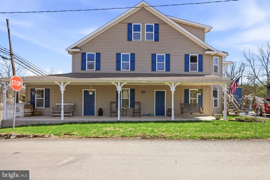 Bring your imagination to this multi generational gem! Unique opportunity to add living space to this already spacious home. The kitchen and dining area offer an open concept with sliders out to the deck. Four bedrooms with lots of closet space, a living room, and laundry room complete the first floor. The second floor is roughed in with framing and electrical for another living space upstairs. This property also has a 1 bedroom in law suite with a new kitchen on the main level! There is an additional self sufficient 1 bedroom apartment in the rear of the property. Completed with a large barn for storage on the property and several pens for farm animals this property is sure to impress! Schedule your showing today.