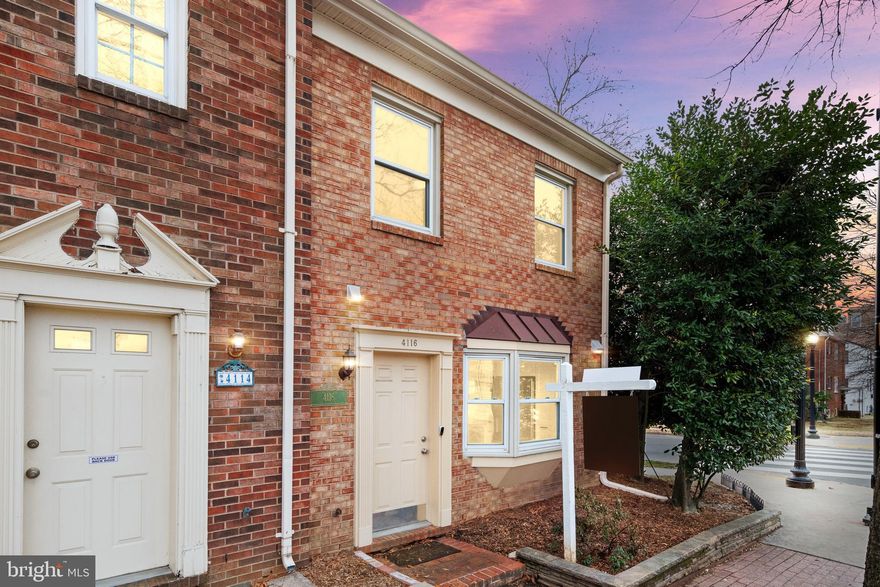 Welcome to this beautiful 3-bedroom, 3.5-bath all-brick end-unit townhouse, ideally located in the heart of Ballston—just three blocks from the Ballston Metro! Step inside to a bright and open floor plan with gleaming hardwood floors. The main level features a totally renovated eat-in kitchen with custom cabinets, ample storage, and recessed lighting, along with a separate dining area and a spacious living room. Upstairs, two generously sized bedrooms each have their own renovated en-suite bathroom, while the third bedroom and recently renovated bath are located on the third floor. A second-floor laundry area adds to the home's convenience. Other updates include a new rear patio door(2023), HVAC 2018, and stacked washer-dryer.  All updates and upgrades have been in the last 5 years.  You have nothing to worry about. Outside, two assigned parking spaces number 1 and 2  right off the patio provide extra convenience and a grassy side yard has the potential to be fenced in. This community has a shared outdoor common area maintained by the HOA. With plenty of space and an unbeatable location, this home offers effortless access to the Metro, Ballston Quarter, and Ballston Exchange—perfect for vibrant city living!