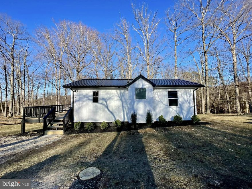 Nestled on 0.42 acres near the tranquil Shenandoah River, this beautifully renovated home offers the perfect blend of modern comforts and nature’s beauty. Every inch of this property has been thoughtfully updated, with brand new features throughout, making it truly turn-key and ready for you to enjoy.

Key Features:

Exterior & Structure: Brand new siding, metal roof, windows, and exterior doors provide both aesthetic appeal and long-lasting durability. Enjoy peace of mind knowing the home is built to last with new insulation in the walls, attic, and crawl space.
Interior Updates: Enter inside to discover gorgeous new hardwood and tile floors, including heated tile flooring in select areas for added comfort. Every room features fresh, modern interior doors and lighting, creating an inviting and stylish atmosphere.
Gourmet Kitchen: The heart of the home has been completely transformed with brand new quartz countertops, sleek stainless steel appliances, a built-in oven, cooktop, microwave, and dishwasher – perfect for culinary enthusiasts!
Luxurious Bathrooms: The newly renovated bathroom is a retreat, with modern finishes and thoughtful touches to enhance your daily routine.
Comfort & Efficiency: Stay comfortable year-round with a brand new mini-split HVAC system for efficient heating and cooling. The wood stove adds an extra cozy touch during colder months. A new water heater ensures you’ll always have hot water when you need it.
Convenience & Style: The washer and dryer are conveniently included, making laundry a breeze. The gravel driveway offers ample parking, and the new landscaping adds curb appeal and enhances the outdoor space.
Located near the scenic Shenandoah River, you’ll love the serene setting and easy access to outdoor activities. Whether you’re kayaking, fishing, or simply enjoying nature’s beauty, this home offers an ideal location for river lovers.

Don’t miss out on the opportunity to own this immaculate, updated home! Schedule a tour today to see all that it has to offer.