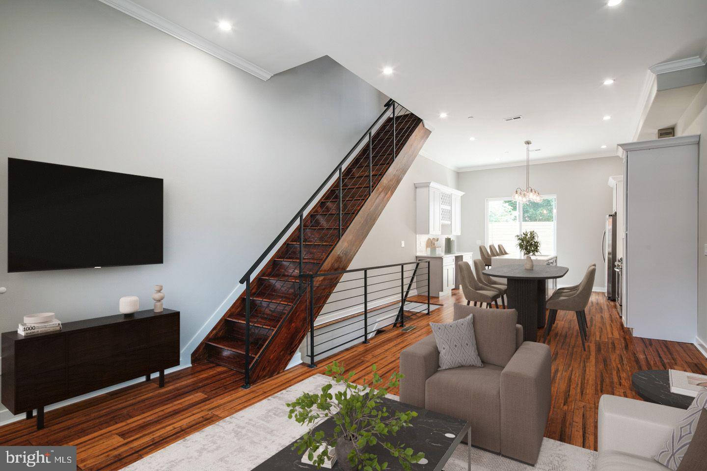 GRAY'S POINTE:: These 4 Bedroom, 3 bath, luxury homes feature 1 car deeded PARKING! Huge 2780+ square feet. Gray's Pointe is a 25 townhome (each home with parking) community featuring light-filled, extra wide (16 ft each) on the edge of burgeoning Point Breeze and up & coming Grays Ferry neighborhood. 5 years remaining on the TAX ABATEMENT!
FIRST FLOOR: After parking your car in your off-street, dedicated spot & walking 15 feet to your front door, enter the home featuring an open-concept floorplan with soaring ceilings featuring custom walnut-stained hardwood floors, crown molding, and custom millwork. The custom Kitchen features soft gray base cabinets, white upper cabinets, an island, butler pantry, wine lattice, high-end Samsung Stainless Appliances, soft-close Shaker-style cabinetry, and White Quartz stone counters. The entire first floor is flooded with light from two extra-large front Pella windows & sliding doors leading to the back patio, ideal for grilling & a bistro set.
LOWER LEVEL: features a HUGE Bedroom with 2 large customizable closets & full bathroom featuring walk-in shower with Antracita flooring tile, stacked white tiles, glass shower enclosure & floating vanity. An ideal private reprieve, playroom or ideal bedroom for visitors or roommates.
2nd FLOOR: features 2 large bedrooms with large customizable closets, laundry closet with stacked Samsung Washer/Dryer, full bathroom featuring tub with Antracita flooring tile, stacked gray tiles & floating vanity.
3rd FLOOR: The entire floor is dedicated to the Master suite! Huge Bedroom with bay window area ideal for desk, enough space for a king sized bed/dressers & chair, HUGE customizable walk-in closet, coffee bar with sink, HUGE 4-piece bath featuring Carrera marble porcelain shower & floor tiles, 5 inch hexagonal Carrera marble floors, rain head shower, free-standing bathtub with separate tub filler and cleansing wand & floating double vanity.
ROOFDECK: the stairs leading to the roof deck are oriented to the rear, allowing for a large, Private fiberglass roof deck with skyline views, ideal for entertaining, play, or simply relaxing or working.
EXTRA & COOL TECH FEATURES: Ring Doorbell (answer your door from anywhere in the world!), Nest Thermostats (schedule for efficiency & save money), Schlage Combo Deadbolts (give access to those needed or prevent lockouts) , High-Efficiency/sound reducing Pella Windows, Bluetooth Surround ceiling speakers, USB capable outlets. The walk score is high at 85, near public transit and very bikeable (to Center City and Schuylkill River Park).