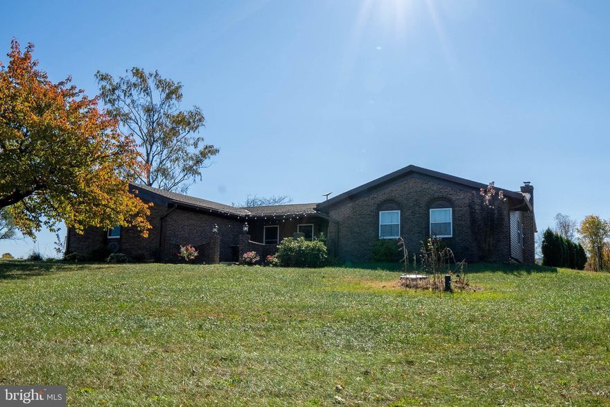 Enjoy the comfort of this spacious ranch-style home set on over 2 acres of picturesque land, complete with stunning views of the Blue Mountain Ridge. Perfect for families or anyone seeking a tranquil rural lifestyle, this property offers both warmth and versatility for everyday living.Pets are allowed on a case-by-case basis.
Main Level:
4 Bedrooms: Including a spacious master suite with a walk-in closet and full bathroom.
Living Space: Bright and airy living room leading to a sunroom, perfect for enjoying morning coffee or evening sunsets.
Kitchen & Breakfast Nook: Fully equipped kitchen with ample storage, adjacent to a cozy breakfast nook.
Full Bath: Conveniently located on the main level.
Two Additional Rooms: Versatile spaces that can be used as bedrooms, offices, or playrooms.
Attached Garage: Easy access and added convenience.

Fully Finished Basement:
Family Room: Large, inviting area with a second kitchen and eating space, ideal for entertaining.
Extra Rooms: Two additional rooms perfect for offices, guest rooms, or storage.
Half Bath/Laundry Room: Functional space for laundry and guests.
Wood Stove: Adds warmth and charm during the cooler months.
Outdoor Space:

2+ Acres: Enjoy the beauty of nature with expansive views and plenty of outdoor space for gardening, playing, or simply unwinding.
This property combines rural charm with modern amenities, making it a perfect place to call home. Don’t miss out on this unique rental opportunity!