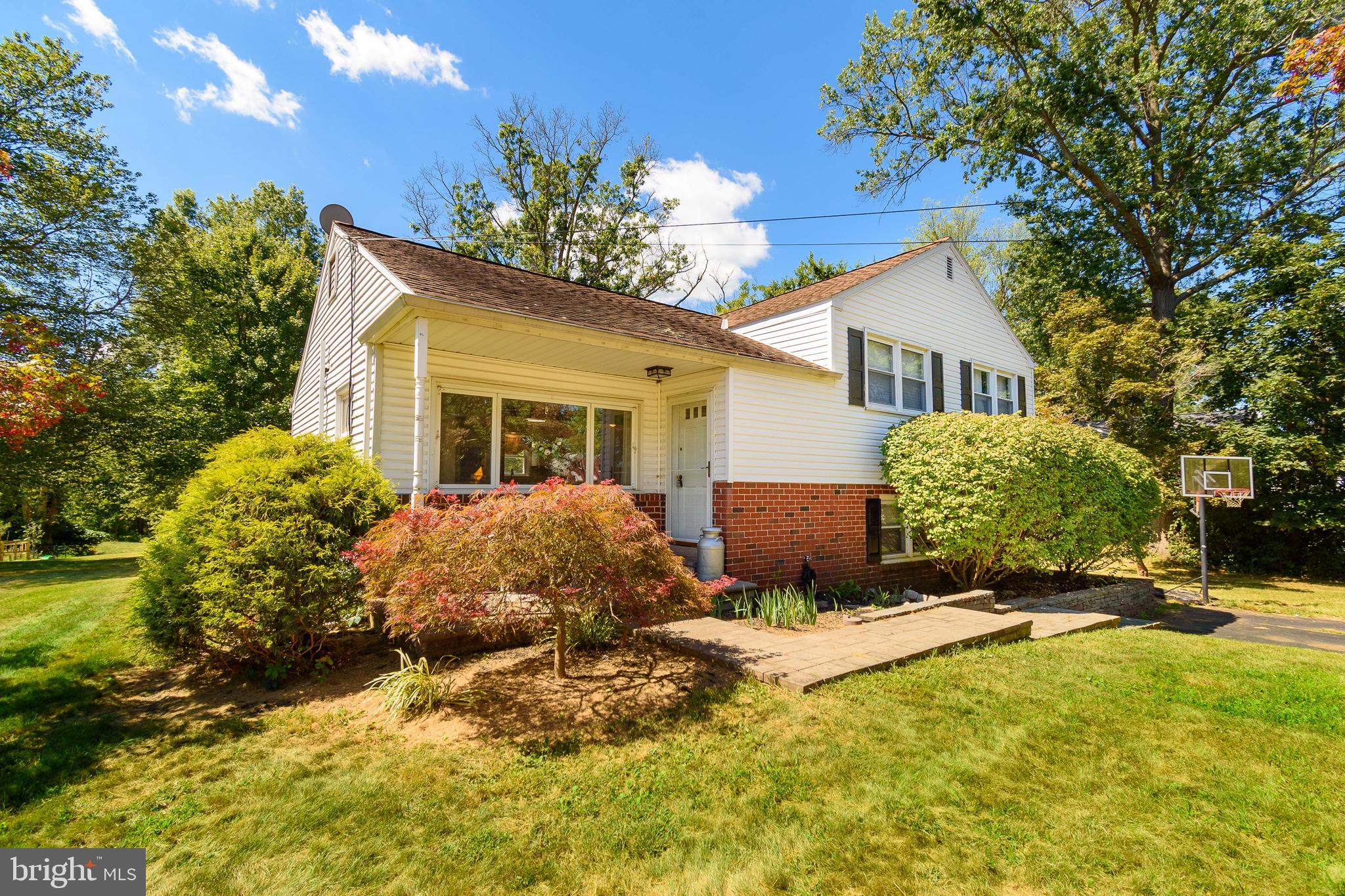 Welcome Home to 980 Jacks Lane – discover this charming and upgraded 3-bedroom Split-Level Home in the highly regarded North Penn School District. Take note of the wonderful covered front porch as you approach the main entry. The entry level features a spacious and welcoming family room that opens to a modernized kitchen, which the current homeowners implemented in 2018, creating an optimal layout for entertaining guests. Many of the areas of the home have just been recently professionally painted in January 2025. The kitchen was remodeled in August of 2025. Upstairs, you’ll find three spacious bedrooms, a full bath with tub shower combo, and access to a large walk-up attic for additional storage. The expansive walk-out lower level includes a cozy living area with a wood-burning fireplace, a powder room, a side-entry door providing access from the driveway, a delightful three-season sunroom that opens to serene views of the large private backyard, and access to the basement level. Located in Upper Gwynedd township, this home is perfectly positioned for convenience, with quick access to major routes like Route-202, Route-309, the PA Turnpike, and the Blue Route. Enjoy proximity to excellent schools, companies, health care facilities, shopping & dining, golf courses, and much more, making this property a perfect combination of comfort, style, and practicality. Schedule your visit today!
