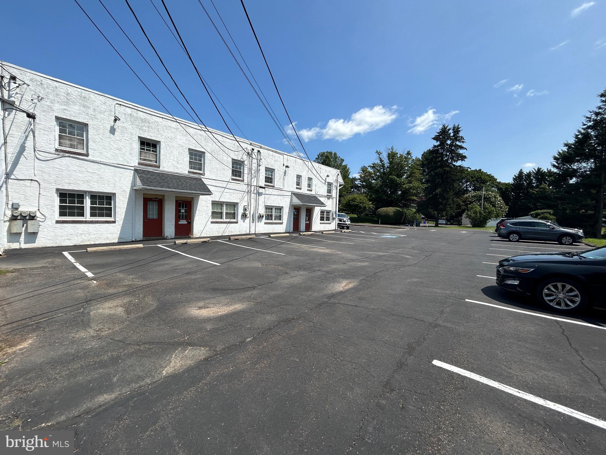 56 Newtown Richboro Rd is a great commercial space for your business! This space, formerly used as a doctor's office features 1400+ square feet, 5 patient rooms, 2 waiting areas and three bathrooms between the two connected offices. There is plenty of parking at the Professional Center as well. The building sits right next to the new Firehouse on Newtown-Richboro Rd, and steps away from the bustling and lively Richboro Shopping Center! Schedule your tour today! The listing price is for both offices. You can rent half the space or all of it. This is a double wide unit. Take one or both. Each unit has 2 unasigned parking spaces but there are over 18 spaces in total.