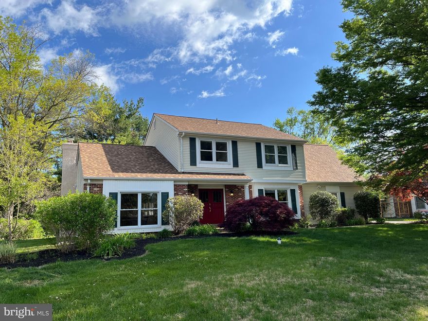 Not your typical Yardley Hunt home.  This spacious 3,116 sq ft, sun-filled home features exquisite custom millwork, dentil moldings, wanescoting with raised panels and trim, plus beautiful custom built-in corner cabinets in the living room and dining room. The kitchen (14 x 22) has custom made kitchen cabinets, center island with seating, brand new stainless steel appliances, granite counter-tops, ceramic backsplash, beautiful refinished wide plank pine flooring plus an exquisite custom breakfront.
The family room has french doors to the yard and 15-lite pocket doors to the living room, plus a built-in cabinet and wood-burning brick fireplace. Upstairs are 4 nice sized bedrooms. The spacious master has double closets plus a remodeled bath with a huge walk-in shower. The second bedroom (20 x12) is a delightfully sunny retreat with built-in shelving and storage cabinets.
Additional features: wood floors in the foyer (14 x 12) and dining room. Box and bay windows, first floor laundry room, pantry and broom closets, six-panel doors, newer roof (May 2023), partially finished basement, rebuilt chimney, remodeled powder room, 2-car side entrance garage, oversized rear cement patio.