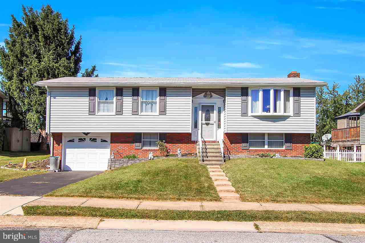 This meticulously maintained split level is calling your name! Located in Dover schools situated in a quiet neighborhood. This home features 4 beds 2.5 baths, large partially covered deck, with a nice flat yard. 1 car garage