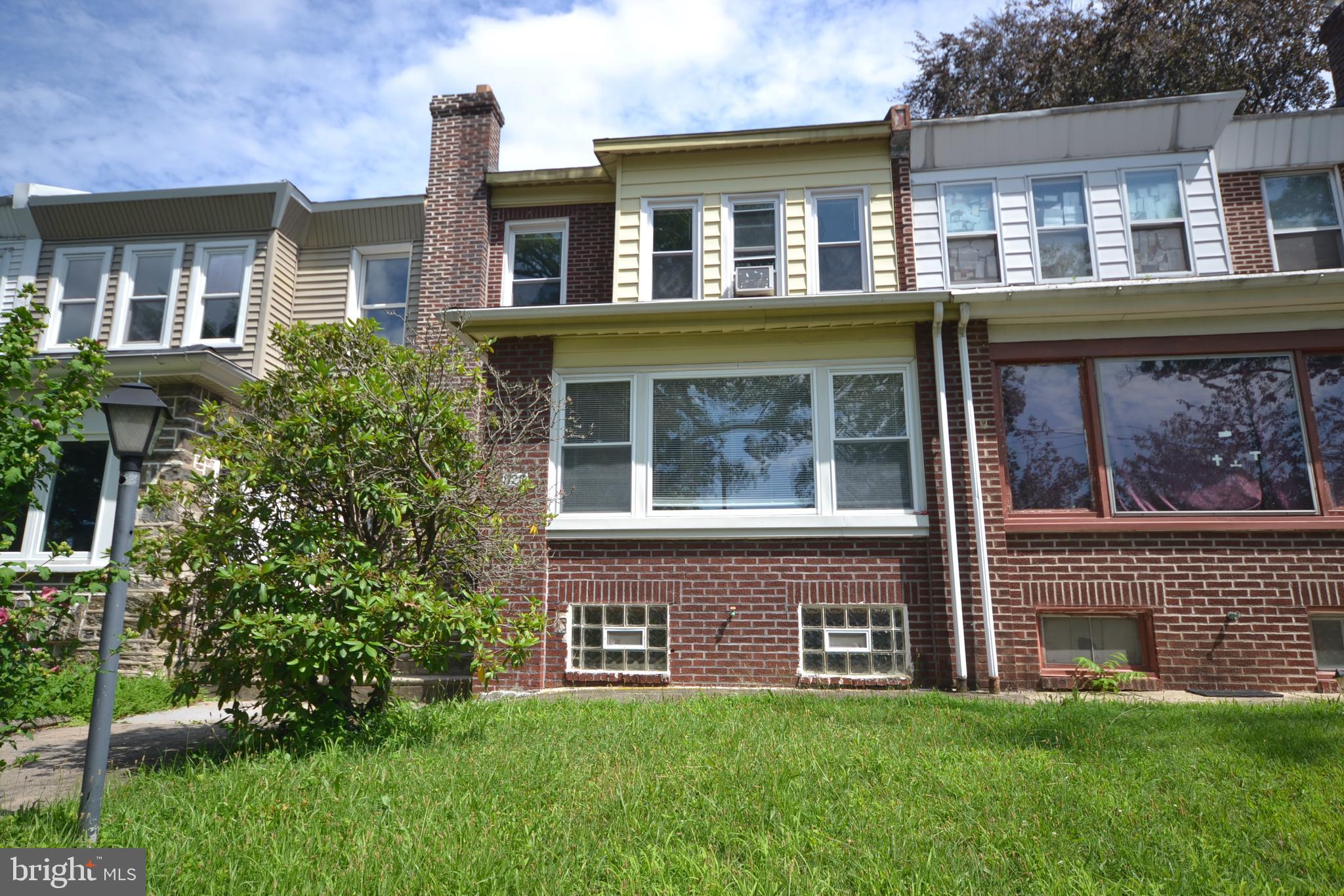 Welcome to this beautifully updated rowhome on a charming, tree-lined street in the heart of East Mt. Airy. This home offers comfort, style, and convenience in one of Philadelphia’s most walkable neighborhoods. Step inside to discover warm, gleaming parquet flooring that flows throughout the main living space featuring a large stone fireplace, recessed lighting and half bathroom. The bright and airy layout includes an inviting enclosed sun porch—perfect as a cozy reading nook, morning coffee spot, or flexible bonus space. The heart of the home is the stunning brand-new kitchen, featuring sleek white cabinetry, marble countertops, and stainless steel appliances. The kitchen is adjacent to the formal dining room, ideal for both everyday living and entertaining.
Upstairs, you’ll find a completely renovated bathroom with contemporary fixtures and finishes, along with comfortable bedrooms filled with natural light. Step outside onto your brand-new rear deck, ideal for relaxing evenings or weekend gatherings. A rear garage and driveway parking completed this perfect package. Situated just steps from public transportation, local shops, and vibrant eateries, this move-in ready gem offers both urban accessibility and neighborhood charm.
Don’t miss your chance to own a beautifully upgraded home in one of Northwest Philly’s most sought-after communities. Schedule your showing today!