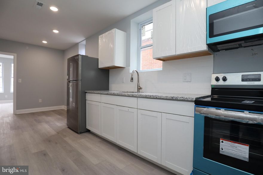 Welcome to a remarkable living experience in our recently renovated three-bedroom, one-bathroom apartment conveniently located near Temple University. This unit offers a perfect blend of style and comfort, featuring upscale upgrades that will exceed your expectations.

Step into the apartment and be greeted by luxury vinyl flooring, which spans throughout the entire unit, complemented by recessed lighting that creates a warm and inviting ambiance. The kitchen boasts elegant granite countertops and is equipped with sleek stainless steel appliances, giving the space a truly modern and sophisticated feel.

The bathrooms are designed with your relaxation in mind, featuring ceramic tile throughout and a generously sized bathtub where you can indulge in soothing soaks after a long day. Convenience is key, and this unit includes a large stackable washer and dryer to effortlessly handle all your laundry needs.

Ensuring your peace of mind, the apartment building is equipped with a contemporary electric keypad on the door, providing both easy access and enhanced security for your utmost convenience and safety.

In addition to its stylish features, this apartment also offers ample storage space in each of the bedrooms, allowing you to keep your living areas organized and clutter-free.

Don't miss out on this spacious and modern apartment that offers an exceptional living opportunity. Contact us now to schedule a viewing and secure your new home today.