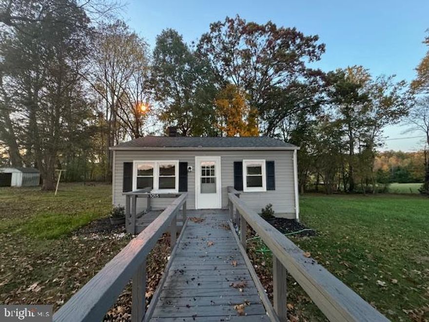 Nestled on 3.30 serene acres, this beautifully renovated one-level cottage offers the perfect blend of modern comfort and country living. Enjoy the breathtaking fall foliage right from your doorstep! Inside, you'll find new carpeting throughout, an updated bathroom, and vinyl floors that enhance the cozy atmosphere. With updated windows inviting plenty of natural light, this home is ideal for those seeking tranquility and privacy with beautiful view. Don’t miss your chance to own this peaceful retreat—schedule a showing today!