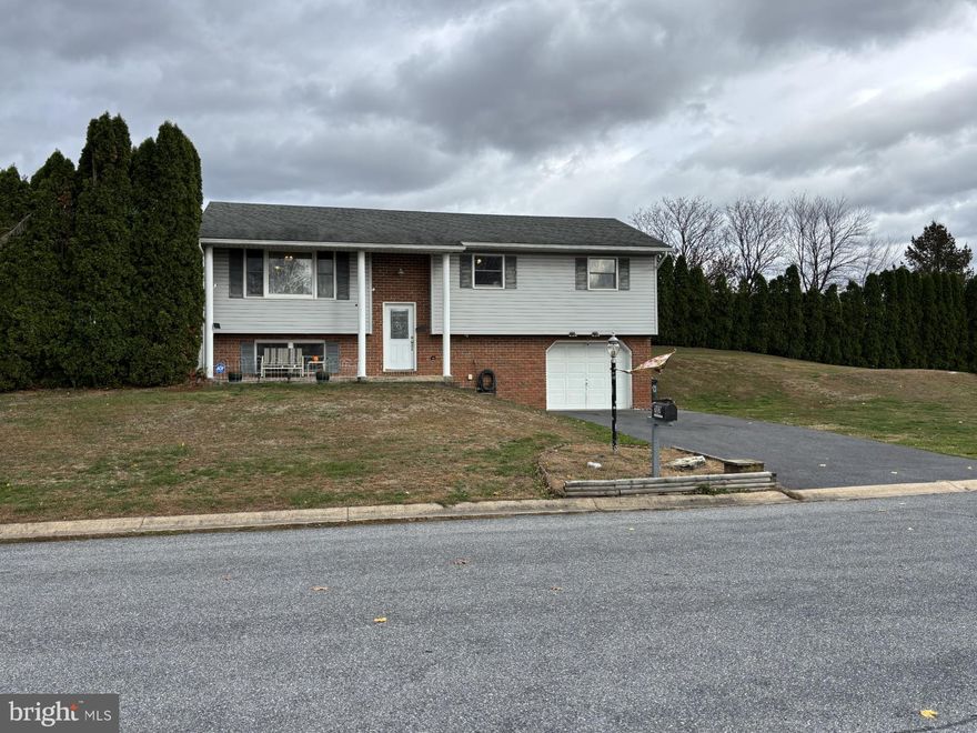 Home is located on a large lot in Cornwall Lebanon school district. Features a spacious eat in kitchen, formal living room. You will appreciate the family room next to the kitchen for additional living area as you unwind by the gas fireplace or entertain family and friends. Deck access located next to family room. Recent improvements; water heater, new flooring in 3 bedrooms.  Roof and heating 11 years ago. Daylight lower level is finished and includes a laundry room. Garage has ample room for storage. Call today to schedule your tour.