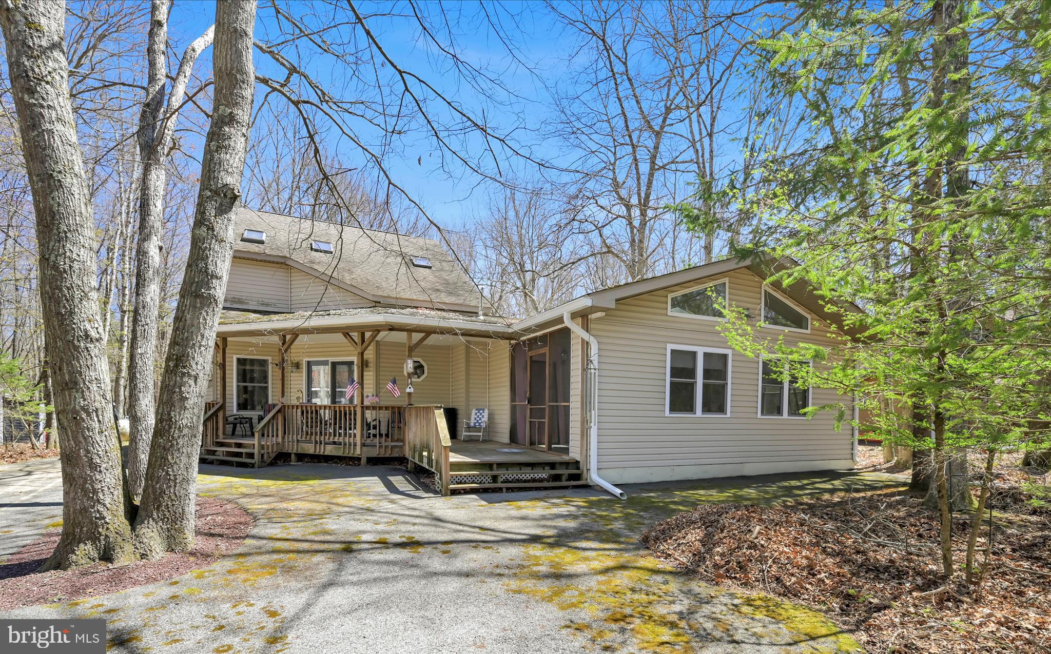 BIG PRICE REDUCTION! This large home in Towamensing Trails offers almost 3,000 sq feet of living space! The possibilities are endless in this spacious property offering 4 bedrooms, 3.5 baths, living room, great room, sunroom, sun porch, formal dining room and 2 fireplaces plus the added peace of mind of a generac whole home generator. The home allows many options including a separate in-law/guest suite on the second floor, short term rental opportunity, or just a quiet getaway home large enough to invite the whole family! The Towamensing Trails neighborhood is short term rental friendly and offers wonderful amenities including a pool, lake with beach, clubhouse, playground and more. The original portion of this home just received fresh paint, included freshly painted cabinets, new carpet and new lvp flooring making this an amazing home for the money.....schedule your showing today!
