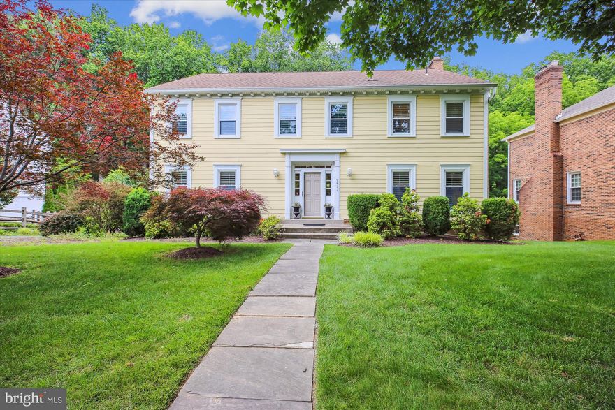 Fall in love with 9417 Reach Road, nestled on a quiet street in the desirable Fallsreach community of Potomac. This classic colonial offers 4,590 total square feet and features 4 spacious bedrooms, 2 full bathrooms, and 3 convenient powder rooms. This well maintained home features: Newer Hardie Plank Siding (10 yrs), Newer Roof (15 yrs), Newer Deck (5 yrs), HVAC replaced (2021), Hot Water Heater replaced (2016). Highlights include hardwood floors, recessed lighting, crown molding, chair railings, a fireplace, ceiling fans, and an abundance of windows that fill the home with natural light. Set on a .28-acre lot, the property boasts a large backyard that backs to woods, along with a deck and walkout lower level—ideal for relaxing or entertaining.

At the heart of the home, the updated kitchen showcases granite countertops, stainless steel appliances, crisp white cabinetry, a center island with breakfast bar, a pantry, and a breakfast area framed by windows. The kitchen opens to a spacious family room with access to the deck and a cozy fireplace set in a rustic stone surround. Formal living and dining rooms, a powder room, an office, and a large foyer complete the main level.

Upstairs, you’ll find four bedrooms, two full bathrooms, a powder room, and a convenient laundry room. The spacious owner’s suite includes a walk-in closet and an en-suite bathroom. The finished walkout lower level features a large recreation room, an additional powder room, and a versatile bonus room—ideal for a home gym, studio, guest space, or more. A generous utility room offers abundant storage, and access to the attached two-car tandem garage is conveniently located on this level.
Ideally located with easy access to major commuter routes, this home is close to numerous parks, recreation options, and nationally rated golf courses—perfect for outdoor enthusiasts. Top-rated Montgomery County schools further enhance its appeal.

Don’t miss this incredible opportunity to own in one of the DC area’s most sought-after communities!