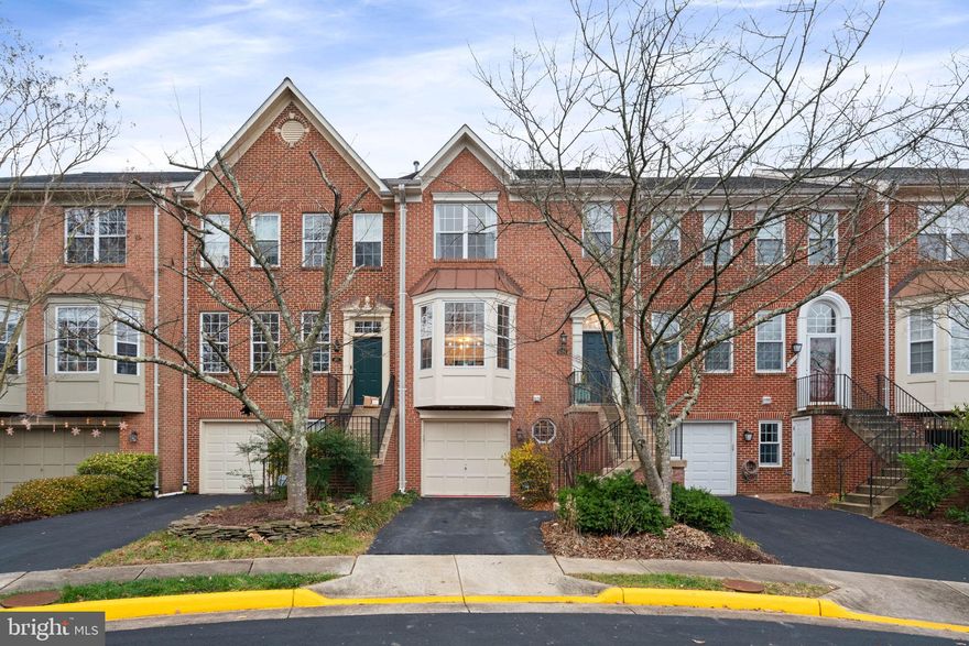 Welcome Home! This beautifully updated townhome in sought-after Kingstowne is nestled on a quiet cul-de-sac and features luxury lime wash paint for a sophisticated, organic touch. Offering over 2,500 square feet of comfortable living space, enjoy an open layout with hardwood floors, a bay window, a modern kitchen with a gas range, and a spacious primary suite with a dramatic high ceiling and soaking tub. Relax on your private deck backing to trees, or gather in the finished basement with a cozy gas fireplace. With a walk-in laundry room, fenced yard, and unbeatable access to shopping, dining, VRE, Metro, and bus services, this home has it all!