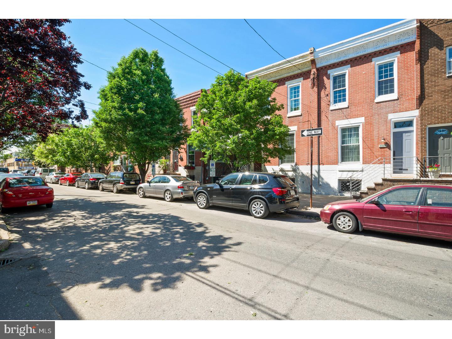 Welcome to this bright, beautiful and spacious home, located on a lovely tree-lined block in the vibrant East Passyunk neighborhood. This home has many wonderful features, including refinished pine wood floors throughout, extra high 9.5' ceilings, an abundance of large windows that welcome in plenty of natural sunlight, and a wonderful oversized backyard oasis. Beautifully tiled vestibule opens into bright living room. Step through a lovely French door into the gorgeously updated kitchen and dining area, featuring crisp white cabinetry, stainless steel appliances and rich butcher-block countertops. Walk-in pantry closet in dining area can easily be converted to a first floor bathroom. The kitchen area opens up to a bonus room that is perfect as a playroom, office, media room or breakfast nook. The large backyard will be an ideal outdoor retreat for you--perfect for playing, relaxing, entertaining or gardening--fruiting peach and fig tree included! 3 bright bedrooms and a stylishly vintage bathroom are on the 2nd floor. Basement is clean and dry--perfect for storage or ready to be finished. This wonderful home is ideally situated--located in the Jackson school catchment, an easy one-block stroll to the famous restaurants and shopping on Passyunk Avenue, just around the corner from the Broad Street Line, and convenient to major bus lines, highways, and Center City. Wow! Come visit and make this house your home today!