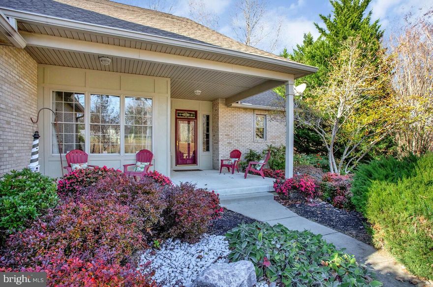 Welcome to this beautifully maintained, custom-built rancher, tucked away on a quiet cul-de-sac in the sought-after community of Saint Leonard. Sitting on just over an acre and surrounded by protected woods, this home offers the perfect mix of privacy, nature, and easy one-level living. The wide front porch sets the tone as you walk inside to an open living room with cathedral ceilings, hardwood floors throughout, and a cozy fireplace and 3 season Sunroom too.

The kitchen features granite countertops, stainless steel appliances, and a breakfast bar that opens to a sunny dining nook overlooking the backyard. A three-season room sits just off the great room—an ideal spot for morning coffee or winding down at the end of the day. The split bedroom layout places the spacious primary suite on one side of the home, complete with a walk-in closet, dual vanities, soaking tub, separate shower, and private access to a screened-in porch. Two additional bedrooms share a Jack-and-Jill bath.

The lower level is built for entertaining with a large rec room, pellet stove, surround sound wiring, dry bar with refrigerator, walk-out access to the patio and gazebo, plus a fourth bedroom, large bonus room, full bath, and ample storage areas.

Located in a peaceful Southern Maryland community known for its rural charm, nearby parks, and water access points along the Patuxent River and Chesapeake Bay, this home blends comfort and convenience. Truly move-in ready with all the upgrades already done. Schedule your showing today! This gorgeous property won't last long!
