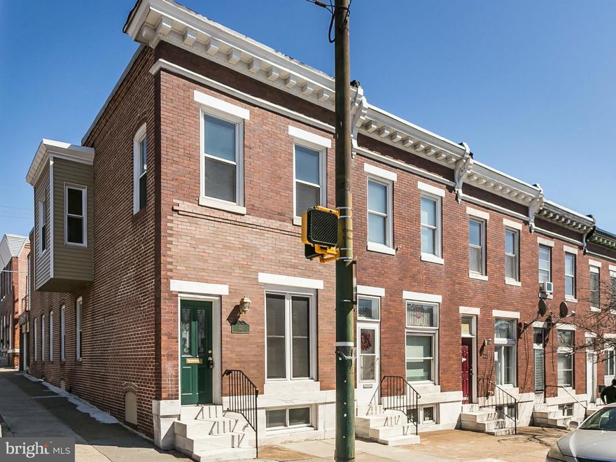 HUGE NEWLY RENOVATED PATTERSON PARK HOUSE WITH ATTACHED GARAGE! Light-filled end-unit boasting 3 large bedrooms, 2 full baths & finished basement. Beautifully renovated, w/ exquisite details throughout: Gourmet Kitchen, Granite Counters, Stainless Appliances, Custom Tiled Kitchen & Baths, and gleaming wood floors. Garage for small car. Just blocks to Patterson Park & Johns Hopkins Hospital.