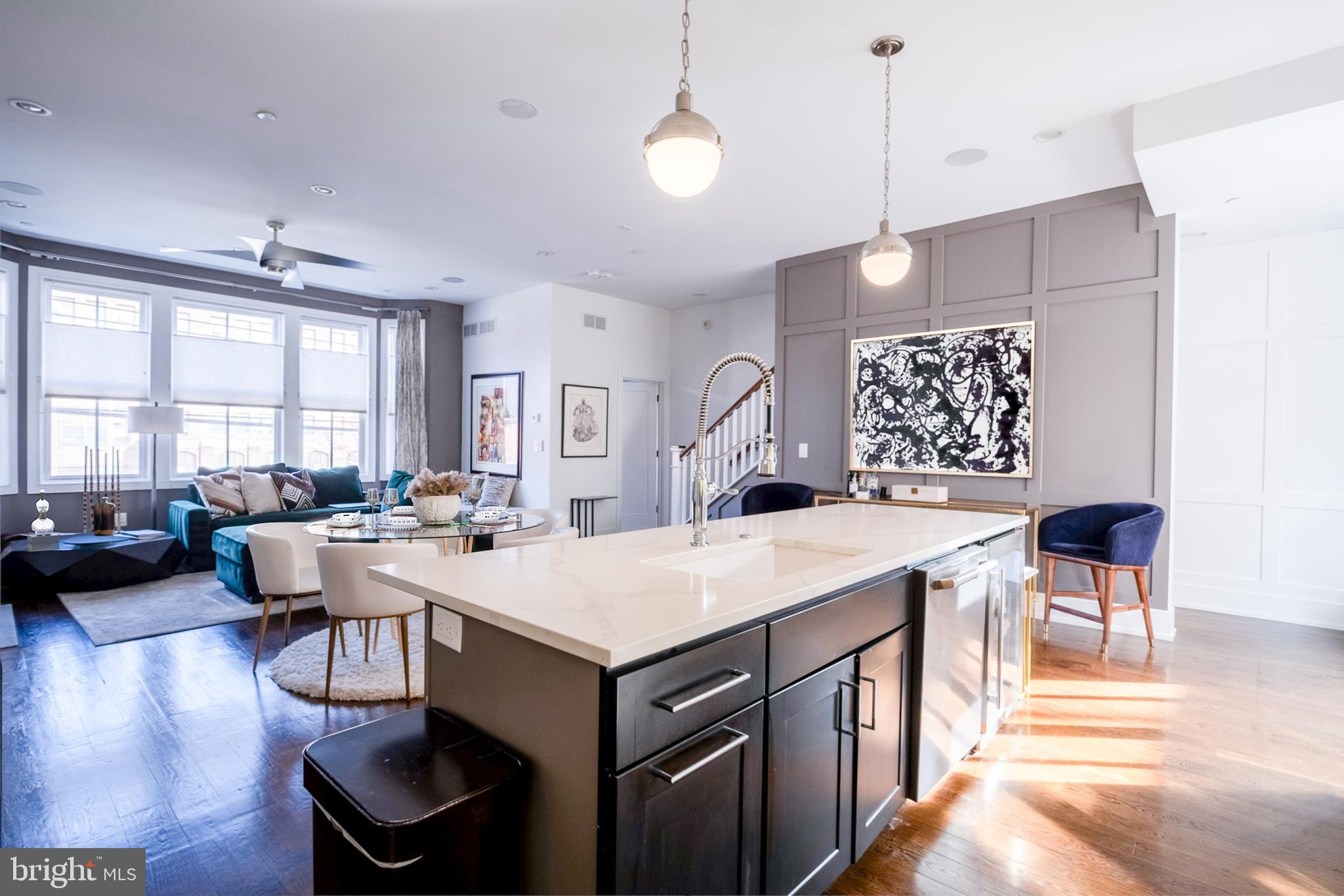 When exceptional design and luxury come together, you get the PERFECT CITY HOME. This pristine, newly constructed residence—offering the benefits of approximately, SIX-YEAR REAL ESTATE PROPERTY TAX ABATEMENT—boasts three spacious bedrooms and represents the pinnacle of modern urban living.
From the moment you step into the grand black and white marble entrance, you are greeted by a sense of sophistication and elegance. The entrance provides convenient access to a WIDE TWO-CAR GARAGE, adding both style and functionality to your daily routine.
The second floor is nothing short of breathtaking. This expansive, OPEN-CONCEPT living and dining area is designed to maximize both comfort and style. A PRIVATE DECK extends your living space for six months of the year, allowing you to enjoy the outdoors in total privacy. The chef's kitchen is a true masterpiece, featuring luxurious QUARTZ COUNTERTOPS, a BREAKFAST BAR, BERTAZZONI ITALIA APPLIANCES— range, vent hood, dishwasher, and refrigerator. All of this overlooks the elegant dining and living areas, where a cozy FIREPLACE and a magnificent BAY WINDOW with eastern exposure invite natural light to flood the space. Completing this floor is a chic, modern HALF-BATH FOR GUESTS.
The next level reveals one of the most impressive primary suites you’ll ever encounter. Generously proportioned and exceptionally designed, this suite is a true retreat. The room is extra wide and spacious, complete with a separate seating area that embraces the BAY WINDOW—creating the perfect place to relax and unwind. A DEDICATED OFFICE AREA in the bedroom completes the luxurious space. The ALL-WHITE MARBLE bath is simply magical, with DOUBLE SINKS, a stunning shower, and a DEEP SOAKING TUB.
On the top floor, you'll find two well-sized bedrooms that offer comfort and tranquility, along with two beautifully tiled full baths. An ADDITIONAL ROOF TOP DECK provides the perfect setting for enjoying the sunset with a glass of wine in hand, enhancing the lifestyle this home offers.
The FULLY FINISHED LOWER LEVEL is as versatile as it is stylish, featuring a full bath and plenty of space to create the perfect family room, in-home office, or exercise area to suit your needs.
Nestled in the vibrant HEART OF THE ART MUSEUM AND SPRING GARDEN NEIGHBORHOODS, this home is ideally situated just minutes from the scenic Kelly Drive, Whole Foods Market, and offers an easy commute to top institutions like the University of Pennsylvania, CHOP, and Temple Hospital. This home combines modern luxury with unbeatable convenience, making it the ultimate URBAN SANCTUARY.