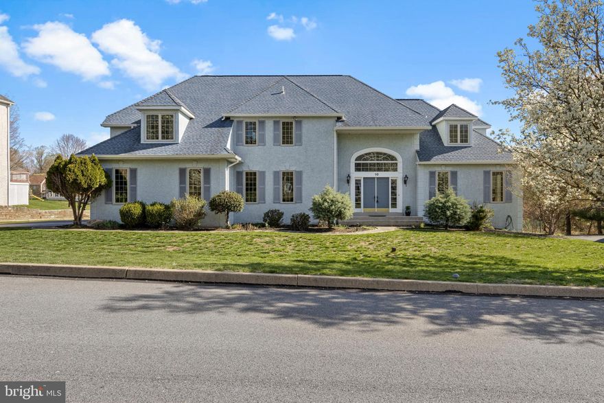 Welcome to 10 Bayberry Drive—a charming residence nestled in one of Broomall's most desirable neighborhoods. This spacious 4-bedroom, 3.5-bathroom home offers 3,943 square feet of living space on a generous lot. Upon entering through the impressive 2-story foyer, you're greeted by hardwood floors that flow seamlessly through most of the main living areas, including the formal dining room. The family room, with its plush carpeting and inviting fireplace, provides a cozy setting for relaxation. Large Anderson windows flood the home with natural light, highlighting its graceful design and neutral color scheme.
The kitchen, the heart of this home, is well-appointed with stainless steel appliances and granite countertops, complemented by a breakfast room that leads to a delightful deck—perfect for entertaining or enjoying a quiet morning coffee. Additional features include an oversized 2-car garage, a main floor office, a small sunroom ideal for cultivating plants, and a formal living room that offers versatility, potentially as a second office space. Upstairs, the primary suite offers a spacious private retreat, while three additional bedrooms and a full hall bathroom provide convenience and comfort. The finished, daylight walkout lower level boasts an second family room and entertainment room, ample storage, a workshop, and an additional full bathroom for added convenience. The exterior grounds are a gardener's dream, featuring several raised bed gardens and plenty of flat yard space ideal for outdoor activities and gatherings. This home invites you to bring your personal touch and create a private sanctuary in Broomall. Discover the perfect blend of comfort and style at 10 Bayberry Drive. Schedule a showing today and imagine your future in this beautiful home.