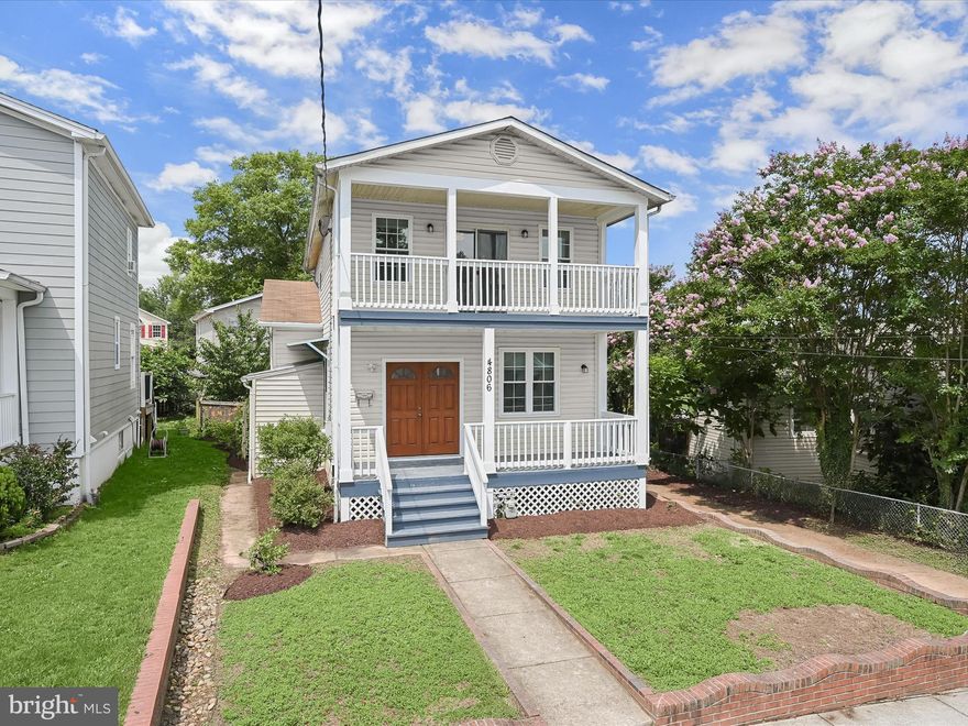 Charming and spacious, this beautifully updated home features two expansive covered porches and fresh interior paint throughout. Step through the double-door entry into a bright and airy living room, complete with gleaming hardwood floors, built-in shelving, and oversized sunny windows, all in a soothing neutral palette. The adjoining dining room is warm and welcoming—ideal for both entertaining and family gatherings. The kitchen offers durable LVP flooring, abundant cabinetry, and gas cooking. French doors open onto a delightful deck, perfect for outdoor relaxation. A conveniently located main-level bedroom and full bath offer added flexibility. Upstairs, the large primary suite boasts plush carpet, sliding glass doors to the second-story covered porch, and an en-suite bath with a luxurious soaking tub. Two additional generously sized bedrooms and a second full bath complete this level. The lower level features a versatile bonus room or optional bedroom, a kitchenette, a second bonus space, and a laundry area. Outside, enjoy the fully fenced backyard and a private driveway with ample parking. All this just steps from the scenic Northeast Branch Trail—offering the perfect blend of comfort, charm, and convenience.