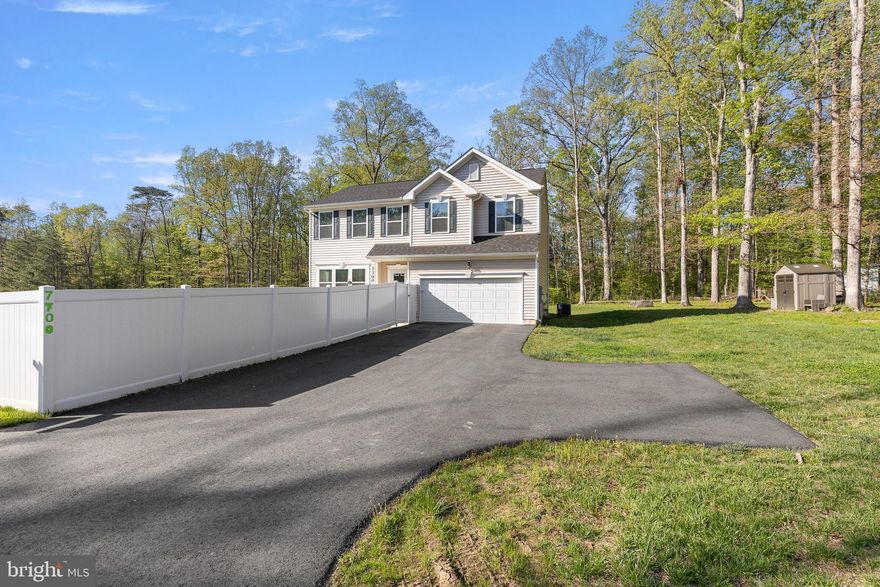 This 3-level home in Gainesville offers 4 bedrooms, 2.5 baths, and a 2-car garage with a wide asphalt driveway. The main level features an open layout with spacious living and dining areas, a light-filled sunroom, and a flex room off the kitchen with barn-style doors that works well for an office, study, or additional living space. The kitchen includes white cabinetry, stainless steel appliances, a center island with seating, pantry storage, and direct access to the rear deck.
 Upstairs, all bedrooms are located on the same level, including the primary suite with tray ceiling, walk-in closet, and en-suite bath with double vanity, soaking tub, and separate glass-enclosed shower. Additional features shown include finished living space across all three levels, updated bath finishes, and carpeted upper-level bedrooms. The exterior includes a fenced rear yard, deck, storage shed, and open lawn space. Convenient location with access to Route 15, Route 29, I-66, shopping, dining, and Wegmans.