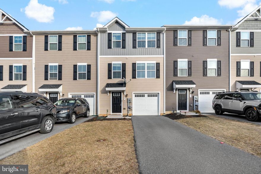 Like new townhome for rent! Just built in 2020, this 3-level townhome has been freshly painted and is move-in ready! Walk in on the basement level that offers a rec room for additional living space. The main level features an open concept with a dining area and spacious living room with an electric fireplace. A half bath is also on this level. Upstairs you'll find 3 beds and 2 full baths, including the primary suite with attached bath and walk-in closet. The community offers walking paths and playgrounds and is just minutes away from Spring Mills area, I-81, and shopping in Martinsburg. **NO SMOKING. PETS ALLOWED ON A CASE BY CASE BASIS AS APPROVED BY THE OWNER. TENANTS MUST OBTAIN RENTERS INSURANCE. Contact listing agent for link to online rental application.