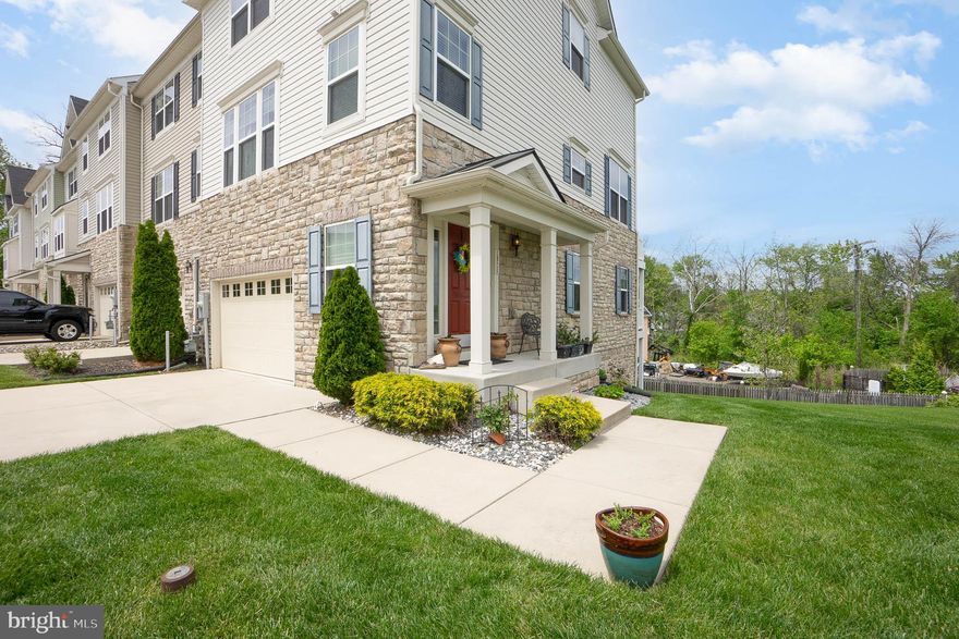 Spacious End of Group Luxury Townhome in Devonport community with Exquisite Sunrise and Sunset Views! Includes exclusive access to the private marina/boardwalk. Sundrenched open concept Living Room with NEW luxury vinyl plank flooring. Gourmet Kitchen with serene colored cabinetry, huge granite 10’ center island, stainless appliances, and fantastic views from every corner. Twilight (2-sided) indoor/outdoor fireplace unites Living Room with one of two maintenance-free composite decks overlooking the water. Upper Level features: Expansive Owners’ Suite with tray ceiling, ensuite with glass enclosed oversized shower, Dual Sinks & private water closet; Two Additional Sizable Bedrooms and Full Bath. Finished Lower Level with Rec Room and two walkout Sliders to Rear Yard. Additional Highlights Include: Entry Level Office/Den with Half Bath and access to 2nd Deck; Off Street Parking in Garage or on Paved Driveway; Upgraded Recessed Lighting Package Throughout; HOA maintained lawn for easy living on quiet non-thru street. Convenient to I-95, 695, shopping & dining, as well as a short boat ride to many waterfront restaurants. Check out the 3D Virtual Tour!