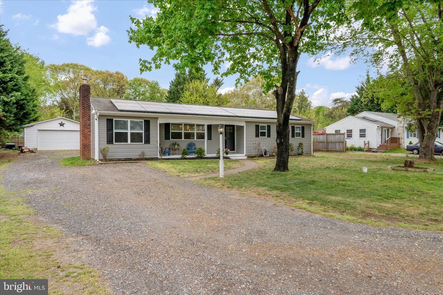 This charming 3 bedroom, 2 bathroom home offers the perfect blend of comfort, convenience, and functionality that has major upgrades including Fresh Paint throughout, Renovated Primary Bath and New carpet. The bonus office room is an essential for remote work! The property also features a large 2-car garage/workshop, you’ll have plenty of room for vehicles, projects, or storage. Step inside to a spacious living room that flows seamlessly into the kitchen, complete with gorgeous granite countertops and newer stainless-steel appliances. The cozy primary bedroom is complete with a wood-burning fireplace ideal for relaxing evenings. Enjoy your morning coffee on the welcoming front porch just across the street from views of the Chester River, or host gatherings in the fenced-in backyard with space for play and gardening. You also have peace of mind with a newer HVAC system (2023) and solar panels for a more energy efficient home! Located towards the end of this peaceful street, you’re close to Chestertown’s historic charm, Washington College, a nearby boat ramp, and tax-free shopping just across the Delaware line and still located in Queen Anne's County!