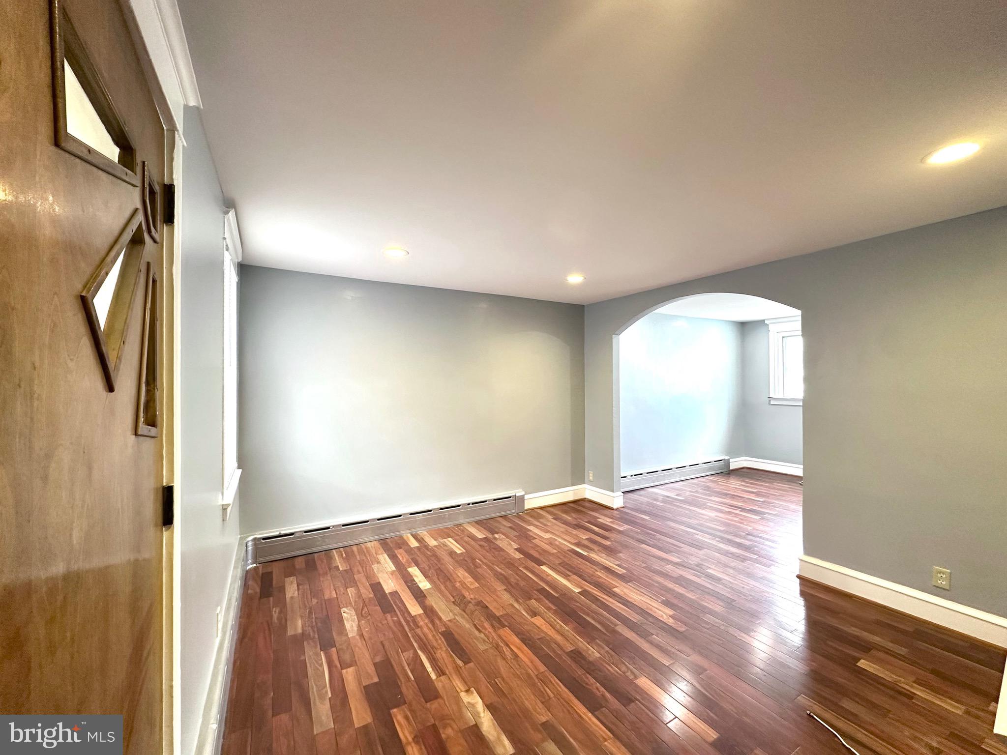 Cozy 3 bedroom 1 bath townhome in quaint neighborhood of Upper Darby. Move in ready, featuring hardwood and tiled floors, recessed lighting, hot water baseboard heating, private parking with fenced yard and well maintain fenced porch. The walkout basement features fully tiles floors, the third bedroom with ample closet space and laundry hookup. Located conveniently near local transportation to take you to the city or surrounding suburbs!