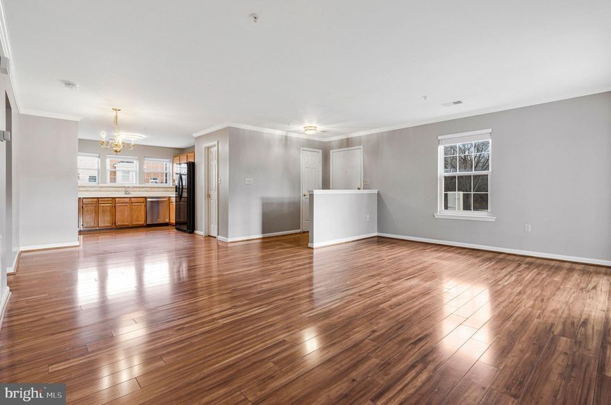 Welcome to your dream condo in the sought-after Applegate community of Suitland! This single-level residence is designed for effortless living. From the inviting covered entrance, step into a spacious open-plan layout that seamlessly blends the living, dining, and kitchen areas—perfect for gatherings or quiet evenings at home. The kitchen features modern appliances, abundant cabinetry, and a pantry for all your storage needs. Enjoy seamless indoor-outdoor living with a private deck accessible from the living room, ideal for unwinding. The home features three comfortable bedrooms, two full bathrooms, and a laundry closet with a washer and dryer for maximum convenience. Tucked away in a peaceful section of the community, you're just moments from major highways, top schools, shopping, dining, and exciting destinations such as Joint Base Andrews, National Harbor, Alexandria, and Washington, DC. Make the most of the amenities, including a serene pond, a playground, a basketball court, and beautifully maintained common areas. Experience the perfect balance of privacy, comfort, and unmatched accessibility—schedule your tour today!