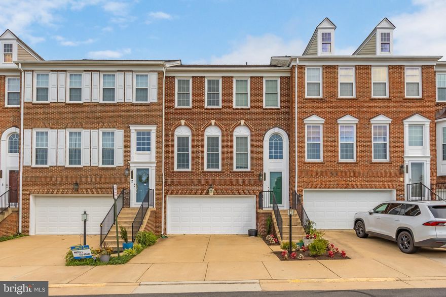 Welcome to this elegantly updated townhome at 8259 Purple Lilac Ct, Lorton, VA—offering space, style, and comfort across three beautifully finished levels! Featuring a generous floorplan and a rare 2-car garage, this home includes a fully finished walk-out lower level with a full bath and the potential for a fourth bedroom, home office, or guest suite. Enjoy outdoor living with a private deck, lower patio, and fully fenced backyard—perfect for relaxing or entertaining.

The main level boasts gleaming hardwood floors, a sunlit family room with a cozy fireplace, crown moldings, and chair rails. The spacious kitchen features an oversized center island, abundant cabinetry and counter space, and a dedicated breakfast area.

Upstairs, you'll find three spacious bedrooms and two beautifully renovated full baths. The luxurious primary suite includes a large walk-in closet, sitting area, and a spa-like bath with jacuzzi tub, separate shower, and dual vanities.

Lovingly maintained and updated in recent years, this home offers comfort and sophistication throughout. Enjoy access to community amenities and close proximity to Laurel Hill Golf Club, Workhouse Arts Center, shopping and dining at Lorton Marketplace, and major commuter routes including I-95 and VRE. A perfect blend of convenience and tranquility!

Recent Upgrades & Improvements:

New windows and sliding doors (2015) – excluding 3 bedroom windows
Roof replaced (2014)
Water heater (2022)
Upstairs bathroom fully renovated (2023)
Basement bathroom completed (2020)
Fresh paint and new flooring throughout main areas (2024)
Brand new carpet (2025)