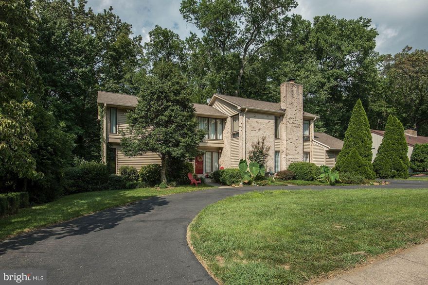 Gorgeous large updated home in Alexandria,  Owners have made many upgrades to the home including: new wood floors main level, updated kitchen with Granite, island and stainless steel appliances, decorative backsplash.  Other items of note are: newer roof (2005)  HVAC  (2011),updated baths, screened porch - large private backyard.  This ideal location minutes to Ft Belvoir, 95, 495/metro. New price