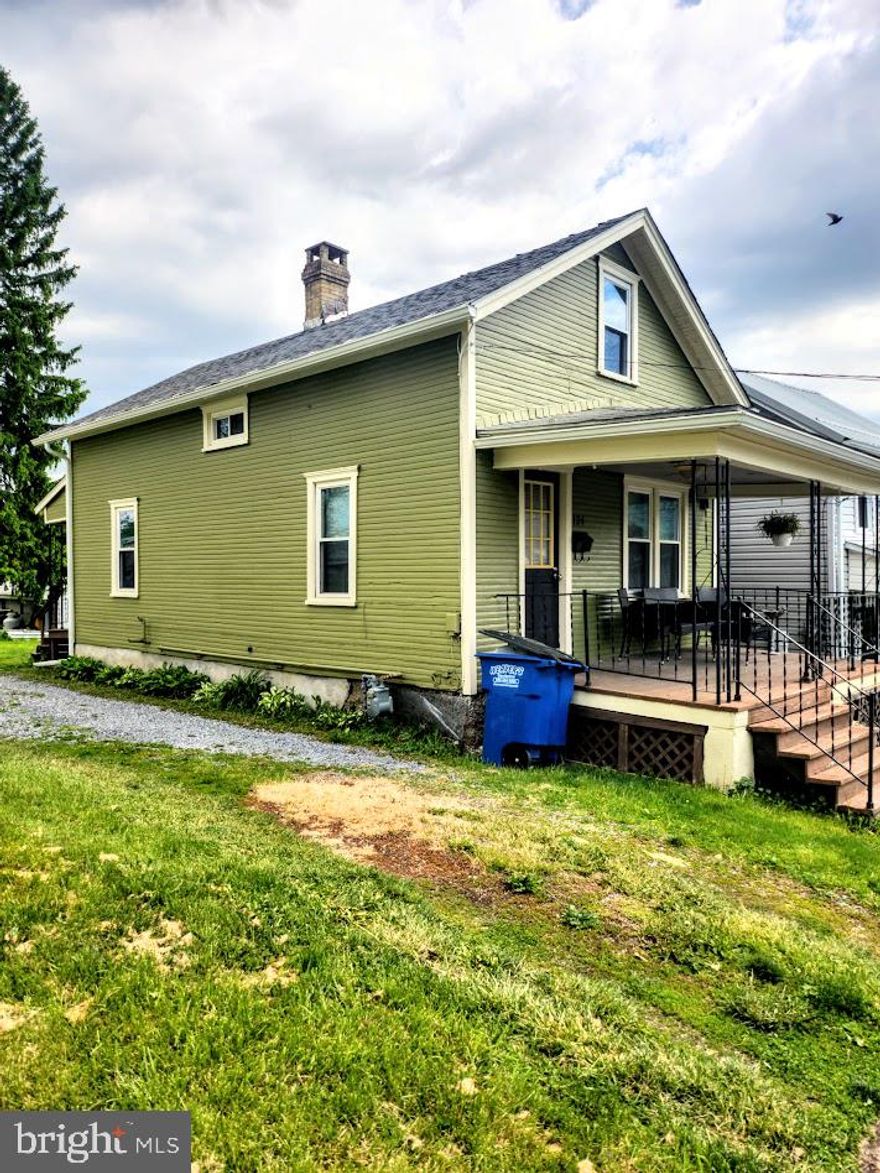 Charming Bedford Borough home situated on a spacious 0.366± acre lot just minutes from the conveniences of town! This inviting 2-bedroom, 1-bath home offers a comfortable and functional layout featuring a cozy living room, dining room, and an efficient kitchen with convenient first-floor laundry.

The exterior has been recently painted, giving the home fresh curb appeal while maintaining its classic character. Relax on the covered front porch and enjoy the neighborhood setting. The oversized lot provides plenty of outdoor space for entertaining, gardening, pets, or simply enjoying extra room rarely found within the borough.

Located close to shopping, restaurants, schools, and local amenities, this property combines small-town charm with everyday convenience. Whether you are looking for a starter home, investment opportunity, or a place to simplify life, this Bedford Borough property offers comfort, character, and potential!