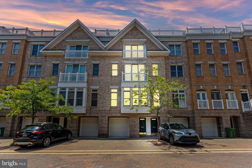 Welcome to 1238 Island Harbor Walk, a luxurious townhome nestled in the highly sought-after waterfront community of The Townes at Harborview. This expansive residence boasts over 2,500 square feet of meticulously designed living space, featuring 4 generously-sized bedrooms, 3.5 bathrooms, and private parking for up to three vehicles (including both a garage and driveway).

Step out onto the spacious rooftop deck—perfect for entertaining guests or simply enjoying breathtaking panoramic views. The community offers world-class amenities such as 24/7 gated security, a resort-style outdoor pool, a fully equipped fitness center, lushly landscaped grounds, a serene koi pond, and a full-service marina. Additional perks include snow removal and ample guest parking for ultimate convenience.

Ideally located just steps from the water taxi and picturesque walking/jogging paths, this home offers effortless access to the vibrant heart of downtown Baltimore. Explore nearby dining, shopping, and cultural experiences, all just moments from your doorstep.