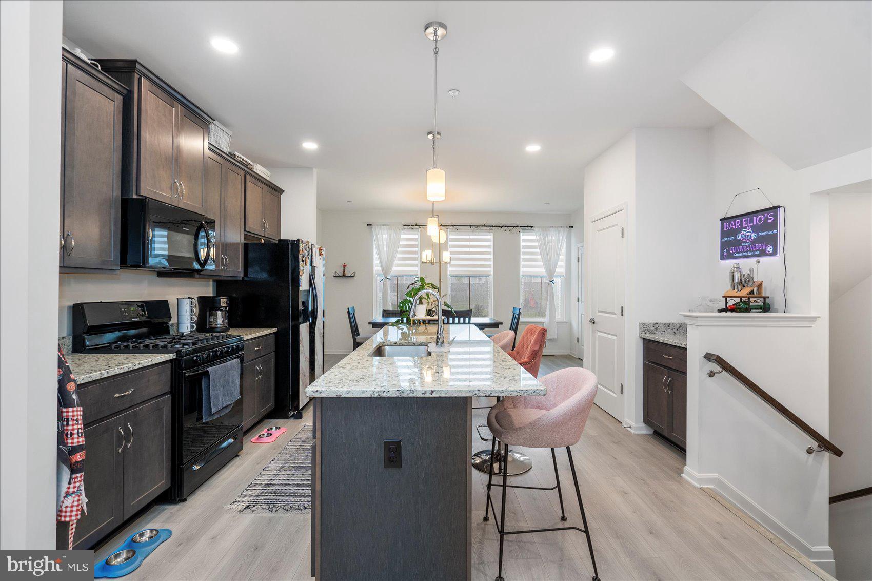 Welcome to this stunning 3-level townhome built in 2021, offering the comfort and peace of mind of a near-new construction with all major systems less than 5 years old. Boasting 4 spacious bedrooms and 3.5 well-appointed bathrooms, this home provides both functionality and style across every level.
Step inside the lower level to find a private bedroom and full bathroom—perfect for guests, a home office, or in-law suite. A beautifully designed foyer and staircase lead you to the bright and airy main level, where an open-concept living and dining area is bathed in natural light. The gourmet kitchen features an island bar with eye-catching pendant lighting, ideal for casual meals or entertaining.
Upstairs, the expansive primary suite includes a luxurious en-suite bath, while two additional bedrooms and another full bath complete the upper level. Step out onto the deck just off the main floor—perfect for morning coffee, evening relaxation, or hosting friends.
This move-in-ready home combines modern design with thoughtful layout, all in a prime location. Don’t miss your chance to own this exceptional townhome!
** PLEASE CONTACT CO-AGENT WITH ANY QUESTIONS **