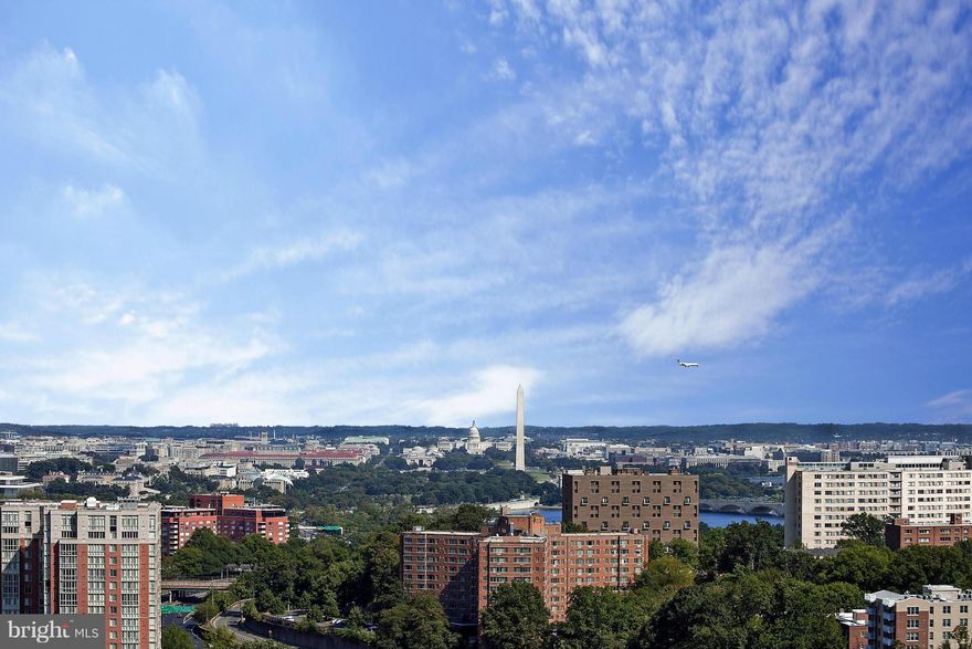 Wall of windows throughout; overlooking panoramic vistas of Washington DC, monuments, Courthouse, and Arlington skylines.  Almost 3,200 square feet of sun bathed open & contemporary design with gourmet kitchen, master suite with balcony, luxurious bathrooms, laundry room, & lots of storage. 3 Bedrooms, 3.5 Baths. 3 parking spots, rooftop pool, exercise room, front desk.  City living at its best!
