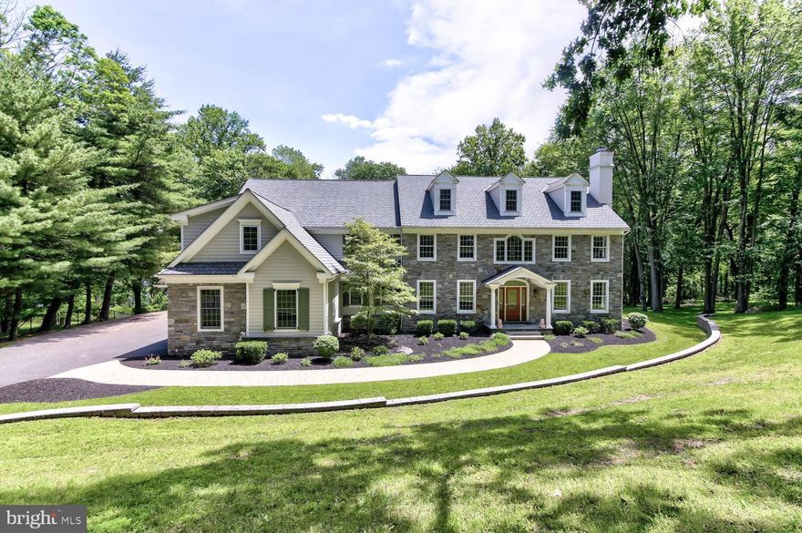 Relax and enjoy the brilliant views of the Springton Reservoir including the majestic bald eagles soaring above the reservoir via the many large picture windows throughout this lovely energy efficient home built in 2008. Living or working in this home makes every day feel like a vacation day. Click on the 360 degree virtual Matterport tour link. This meticulously cared for home was built by award winning custom Main Line builder, Steven A. Papa. NO stucco siding. NO home owner association. Gorgeous open floor plan designed to optimize the stunning panoramic views of each season. This home was designed and built to be maintenance free and “green” with 12 separate HVAC zones for a very low cost of ownership. Several "work or study at home" options are available to you including a finished third level for a large office or home school area. The formal home office features gorgeous cherry wall panels with custom cherry built-in cabinetry, water views and easy access to the large gray paver patio if you prefer to take a break and work outside while overlooking the water. Also, one of the two first floor powder rooms is located next to the formal office. The third floor of the home offers another large office or bedroom, also with water views, for those that need a large space for research projects and or a more isolated work or study space. This home is stunning with 5-6BR/5.3BA home with a 4 car heated garage with over 7,300 sq. ft. plus a finished lower level. Wine enthusiasts will have a 2,000 bottle racked wine room to enjoy. In addition to the great room there is also a very large storage/utility area where you could add an exercise and or home theater. This home has all of the features that a discerning buyer expects in a luxury home in a premiere waterfront location. Elegant appointments throughout including white oak wide plank flooring on the first level with formal staircase and dancing stair banister with all stair handrails artisan crafted of African mahogany striking a beautiful balance with the lovely oak stairs. Elegant handcrafted custom millwork throughout. The fabulous two story, open to the rear of the home, foyer flanked by the spacious formal dining room and formal living room with gas fireplace. Custom wood inlays framing the dining, living and breakfast rooms. The stunning gourmet kitchen with granite counters features a Subzero refrigerator and wine cooler, Wolf ovens and cooktop and large pantry. Spacious breakfast room and family room with coiffured ceiling and stone fireplace mantle. All doors and windows are Pella Architect series selections. 50 year Certinteed roof. Ceiling fans are in most rooms as well. There are several doors leading from the breakfast and family rooms to the lovely paver patio and rear yard. The oversized four car garage has radiant heat in the garage floor which leads to a spacious mud room with pantry, utility and coat closets as well as a powder room.  The second level features including an amazing main bedroom suite with water views, cathedral ceiling plus a stunning sitting room with balcony. The primary bath offers a relaxing spa like experience with radiant floors, jetted tub and large glass shower. The in-law suite or second main bedroom also has serene sitting room water views.  All bedrooms are en-suite with separate thermostats. The exterior of this home is crafted in natural stone across the front facade and hardy board siding on other facades. Consider adding an in-ground pool to overlook the reservoir. Public water and Public Sewer. One year home warranty included. Rose Tree Media School District. Minutes to Philadelphia Airport, train, center city Philadelphia, Wilmington and the Main Line. EA is only 10 minutes away. Enjoy great restaurants and community festivals in downtown Media, West Chester and Wayne. Whole Foods, Rose Tree & Ridley Creek State Parks are only 5 minutes away.