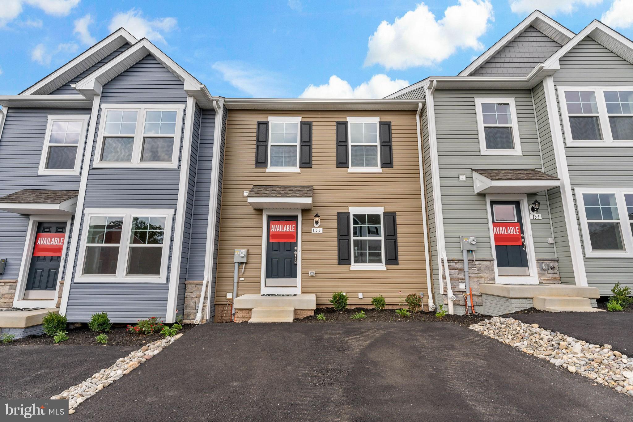 The only brand new luxury townhome with 3 finished levels ready now with white 42 inch upper cabinets that includes a 10 x 10 deck with steps and to fully sodded yard located less than 6 minutes from the MD-PA state line.
*NOW OFFERING CLOSING COST ASSISTANCE FOR PRIMARY RESIDENCE WITH USE OF BUILDER APPROVED LENDER AND TITLE!**ASK ABOUT OUR SPECIAL FINANCING OFFERS**
Why rent when you can own! York Grade townhome offers 4 car parking pad and is close to overflow parking areas. Enjoy a main level entry offering access to family room, kitchen, dining area and included deck (no groceries to carry up the stairs). Kitchen features an extended 8 1/2 ft. quartz prep island with single bowl sink. Upper kitchen cabinets are 42 inch for extra storage. Step out to the 10 x 10 composite deck to enjoy the afternoon sunset and breezes. This home offers a fully sodded back yard and front landscaping package. A 6 x 8 vinyl privacy fence panel separates each townhome in the rear of the home. Community allows fencing and pets. Upstairs primary bedroom features ensuite bath with dual sink vanity, and ceramic tub-shower combo. Primary bedroom offers vaulted ceiling and convenient linen closet and walk-in closet. Laundry closet has included washer, dryer, and two secondary bedrooms feature wall closets. Home includes ceiling fan rough ins, added lighting, and upgraded carpet and padding. Includes an unfinished space conveniently located on lower level perfect for a home gym, storage, project area or finish later to add additional 160 sq. ft. to home.