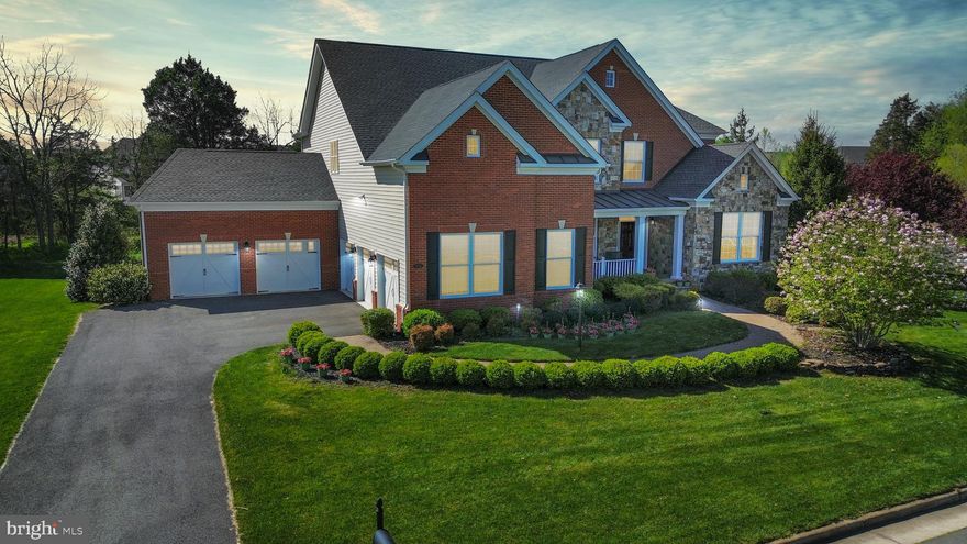 ***OFFER DEADLINE MONDAY (05/13) AT 5PM***Step into a world of refined elegance and unrivaled luxury in the prestigious Lenah Mill community, where this stunning former model home, featuring 4 bedrooms and 4.5 bathrooms, offers more than 5,500 square feet of exquisite living space. The majestic stone and brick facade greets you upon arrival, hinting at the sophistication and grandeur that lie within. Upon arrival, the two-story foyer greets you with its majestic presence, featuring soaring ceilings and an opulent staircase that sets the stage for the exquisite architectural details and grand scale of this east-facing gem. The foyer serves as the gateway to the sunken living room, a feature that instantly captures attention with its unique elevation and provides an intimate atmosphere for entertaining guests or enjoying a quiet evening by the fireplace.  It boasts state-of-the-art appliances, luxurious cabinetry, and an expansive center island. This space is not merely functional but a visual spectacle, designed to cater to both the avid chef and the consummate host. Natural light floods the kitchen each morning, making it a delightful venue for casual breakfasts and elaborate culinary creations. Adjacent to the kitchen, the family room is accentuated with coffered ceilings and another inviting fireplace, crafting an ideal space for family gatherings or hosting informal social events. The seamless integration of kitchen and family room epitomizes open-concept living, facilitating effortless communication and movement between spaces. On the main level, a formal dining room and an additional living area offer more traditional settings for entertaining. Each room is meticulously crafted to uphold a standard of luxury and comfort, with ample space for dinner parties, holiday gatherings, and special occasions. The dedicated office space on this level provides a tranquil environment for concentration and productivity, essential for today’s professionals working from home. A practical mudroom links directly to a 5-car garage, ensuring easy transitions and optimal organization of daily essentials. Ascending to the upper level, the primary suite emerges as a sanctuary of relaxation and privacy. It features a cozy sitting area, perfect for unwinding after a long day, and a vast walk-in closet that caters to extensive wardrobes and storage needs. The en-suite bathroom, with its double vanity, soaking tub, and separate shower, offers spa-like indulgence, reinforcing the home’s commitment to comfort and luxury.  The 3 additional bedrooms, each configured for privacy and comfort, boast an individual bathroom and a Jack and Jill setup, along with plush features that cater to both family and guests with elegance. The lower level of the home reveals a world of entertainment possibilities, featuring a full bar and a large recreational room that can host anything from a game night to a lavish party. A bonus room adds further versatility, serving as additional guest space, a home gym, or a media room, depending on your needs. Walk-up access to the meticulously landscaped backyard—with its stylish patio and outdoor stone fireplace—ensures that the entertainment space extends outdoors. The Trex deck and built-in sprinkler system make this area not only beautiful but also low maintenance. Residing in Lenah Mill means more than just enjoying a beautiful home; it includes access to a vibrant community with amenities like a clubhouse, swimming pool, tennis courts, and various sports facilities. The social committee keeps the community spirit alive with organized events that foster social interaction and neighborhood camaraderie. Enjoy rich cultural heritage, outdoor activities, and easy access to renowned wineries and breweries. Embrace luxury living in Lenah Mill—a lifestyle choice where every detail is crafted for your comfort and enjoyment. Welcome to your new sanctuary.