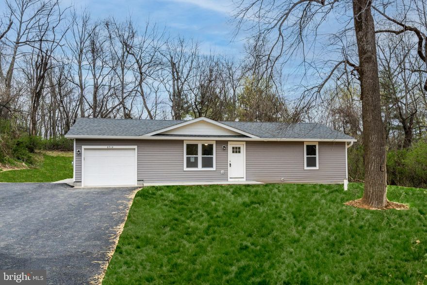 Home is practically new! Completely new electrical and plumbing throughout home, new roof, new HVAC, new windows and doors, new radon system installed, new flooring, new paint, new siding, new concrete walkways and patio, new driveway, new drainage systems installed interior and exterior drain tile around foundation of the home! This open concept main level offers versatile space featuring a sun soaked living room, kitchen with new stainless appliances and garage access, spacious bedrooms, and a large room which would make a great formal dining room or family room with walkout slider to the new concrete patio. The basement offers a vast space great for entertaining or making additional living accommodations. Close proximity to local stores and restaurants while still offering privacy just outside of town. Just in time to get the flowers planted and the grill lit for spring and enjoy the peace this property offers.  Full home inspection report available along with Passing water quality, septic, termite and roof inspections results available!