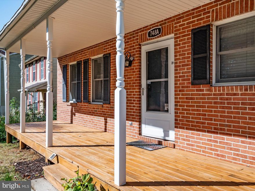 Welcome to your new home at 748A Dividing Rd, where warmth and charm meet modern comfort. This single-family residence, nestled in the heart of Severna Park, offers you a haven of tranquility and endless possibilities for creating cherished memories with the luxury of a water-privileged community. The community boasts 5 water access points, boat slips, kyack and paddle board storage, a playground, a community center, and an ambiance of unity.  As you step inside, you'll immediately feel engorged with the hidden spaciousness the home has to offer. The 4-bedroom, 2.5-bathroom home has over 2400 sq ft; designed with family living in mind, it's a place where laughter echoes through the halls and heartfelt conversations unfold around the firepit. Imagine lazy Sunday afternoons spent on the inviting covered deck, sipping your favorite beverage and admiring your well-landscaped yard. The screened-in deck and the outdoor deck beckon you to host gatherings with loved ones, under the open sky or sheltered from the elements. With a spacious yard that seems tailor-made for play, gardening, or just basking in the sun, you'll find endless opportunities to connect with nature and enjoy the great outdoors. Recent upgrades, including a brand-new roof and HVAC system, ensure that you can move in worry-free and start making this house your own. The thoughtfully upgraded appliances in the kitchen bring life to the main space of the home. What truly sets this home apart is its location in a water-privileged community. Here, you can take advantage of not only the picturesque water access but also a sense of community that feels like an extended family. 748A Dividing rd offers more than just a house; it extends an invitation to a lifestyle enriched by comfort, community, and cherished moments. Don't miss this opportunity to make it your own.