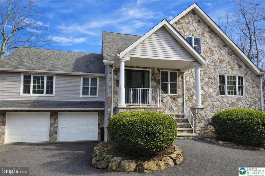 Welcome to 465 Green St, Lehighton, PA — a spacious 4-bedroom, 3-bath home on a 1-acre lot in Carbon County, just minutes from Beltzville Lake and Beltzville State Park. This home features hardwood floors throughout (with tile in the kitchen, foyer, and bathrooms), a kitchen with granite countertops, and large room sizes that provide an open, comfortable layout. The living room includes a tray ceiling and built-in shelving, while the dining room fireplace adds warmth and character. The main-floor primary suite, additional bedroom and full bath and laundry offer convenient one-floor living. Upstairs, you’ll find a magnificent great room, perfect for entertaining, relaxing, or creating a flexible living space as well as 2 additional bedrooms and another full bath with a walk in dressing area. The lower level adds even more functionality with a family room, dedicated office, and two storage rooms, giving you room for work, hobbies, and organization. Additional highlights include central air conditioning, central vac, a 2-car attached garage, and a double driveway for ample parking. Located in an agricultural zoning district, this property offers flexibility and potential for a variety of uses. Enjoy a peaceful setting with easy access to outdoor recreation, boating, fishing, and hiking. Historical Jim Thorpe is just minutes away as well! No showings until after the open house scheduled for Saturday 4/25 from 11am - 1pm.