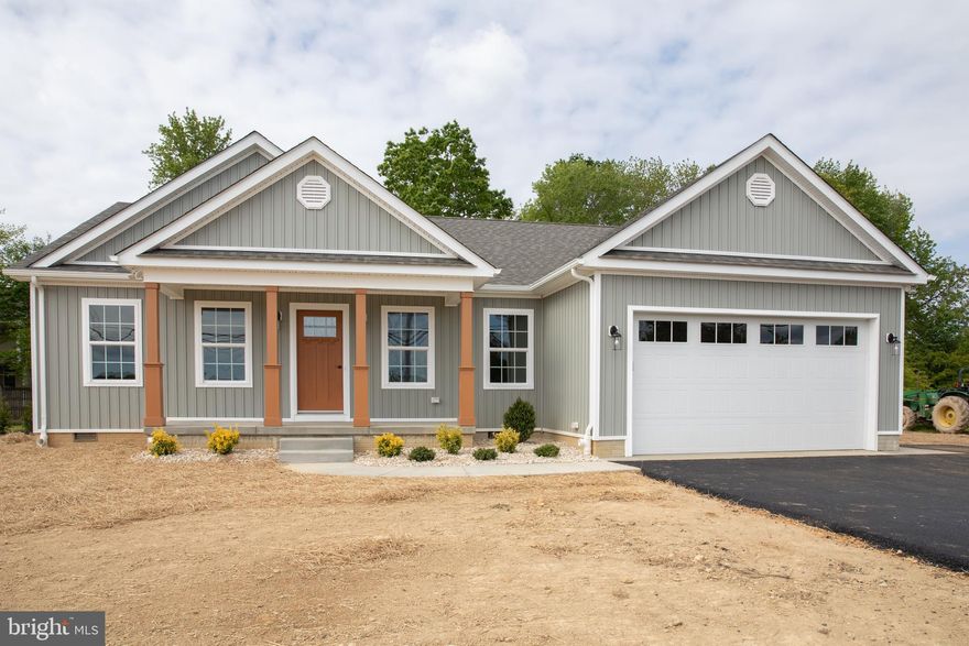 Reduced & New construction, Custom built home, outside features include Composite porch Columns fixed to a poured concrete 6 x 18 front porch, asphalt driveway, landscaping out front, large 10 x 16 rear aluminum screened in  back porch on a poured concrete foundation for entertaining. As you walk in the front door, you will notice a large and open floorplan featuring the living, dining area, and kitchen, perfect for parties and family gatherings. Both the living room and master bedroom have tray ceilings. Kitchen boosts 42 in white shaker cabinets with granite countertops with a Farm style sink, large extra wide island ( 40in x 60in ), great for entertaining of food prep. a 3 x 3 pantry, S/S appl. Master bathroom includes a gorgeous freestanding soaking tub, a 40 x 48 beautifully Tiled walk in shower, 60 in double bowl vanity, shelving for essentials/towels with laundry bin storage, plus a large walk in closet. Secondary bathroom features a 48in single bowl vanity, a 2 x 2 linen closet. The laundry room can easily double as a mud/catch all/r storage room, which can be hidden by a Barn style door, Floors are wood looking waterproof vinyl planking through out the entire home, and all door have both black hinges and handles.  2 of 5 homes in a small community, town of Leonardtown owns the land across the street so no one else can build there. A great place to call home with NO HOA.