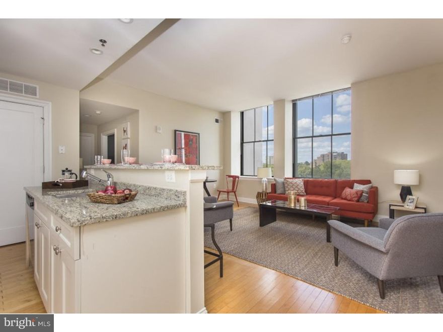 This expansive 2-bedroom, 1-bath apartment at THE SCHOOL ADMINISTRATION BUILDING offers a truly fantastic living experience. Enjoy the spacious and elegant layout with an open-concept living and dining area, perfect for both relaxation and entertaining. The luxury apartments at 230 N 21st (SAB) are designed with modern living in mind, featuring sleek kitchens equipped with STAINLESS STEEL APPLIANCES, granite countertops, and a convenient BREAKFAST BAR. Each unit includes an IN-UNIT WASHER AND DRYER, HARDWOOD FLOORING, HIGH CEILINGS, and EXPANSIVE WINDOWS that allow for ample natural light. For added convenience, the building is cable and high-speed internet ready, an elevator, and doorman service. Some bi-level units are also available. Residents enjoy amenities such as a FULLY-EQUIPPED FITNESS CENTER, an online resident portal for rent payments and work order submissions, and PET-FRIENDLY policies. Parking is available for an additional fee.  The building is nestled IN THE HEART OF THE ART MUSEUM DISTRICT, also known as the Parkway Museums District. This area is home to some of Philadelphia's most famous landmarks, including the Philadelphia Museum of Art, the Barnes Foundation, Franklin Institute, the Rodin Museum, Schuylkill River’s Boathouse Row, and the historic Eastern State Penitentiary. Filled with museums, cultural experiences, and iconic attractions, the district offers something for everyone, whether you're an art enthusiast or looking to explore Philadelphia's unique history. The neighborhood offers a WIDE VARIETY OF DINING, entertainment, and outdoor activities. Within walking distance are popular restaurants such as Figs, The Bishop's Collar, Bridgid's, The London Grill, Zorba's, and Jack's Firehouse, offering a diverse range of dining experiences. Residents can also take advantage of the nearby Winter Street dog park and enjoy scenic walking, running, or biking along Kelly Drive. Additionally, the area offers easy access to SEPTA’s Broad Street line, the Girard Avenue trolley line, Kelly Drive, and I-76, making commuting and transportation convenient. For music lovers, the annual Made in America Festival is also easily accessible, providing an exciting event for residents to enjoy. 230 n 21st is a grand Art Deco-style building located on the picturesque Benjamin Franklin Parkway, offering an unparalleled living experience in one of Philadelphia’s most sought-after locations. **Please note: Photos shown are of a model unit. Actual finishes and layout may vary. Pricing and availability are subject to change.**